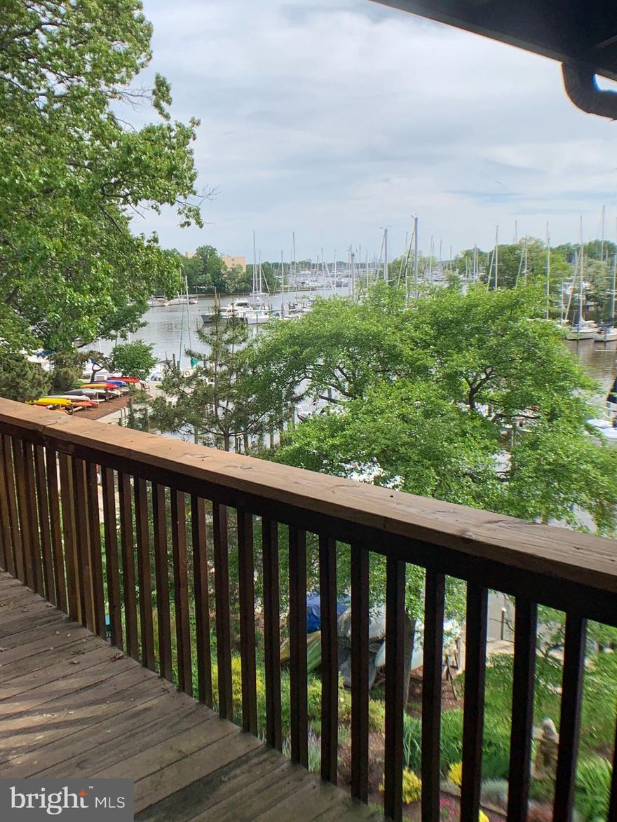Top floor 2-bedroom waterfront unit with beautiful views of Back Creek in the sought after Severn House community in Annapolis.  Two sets of sliding doors to the private balcony from the living and dining rooms allows ample light, and beautiful water-views.  This unit is in very good condition, but ready for your imagination.  Includes a 30' deep-water slip (A-65) with easy access to Back Creek and the Chesapeake Bay.  Slip includes dock box, water and 30 AMP power.  Water depth is approximately 6'.  Buyer should verify depth.  Multiple access points for kayak and paddleboard launching.  No pets allowed in the community.  Condo fees include water, sewer and gas. Tenant occupied so 24 hour notice required for showings.