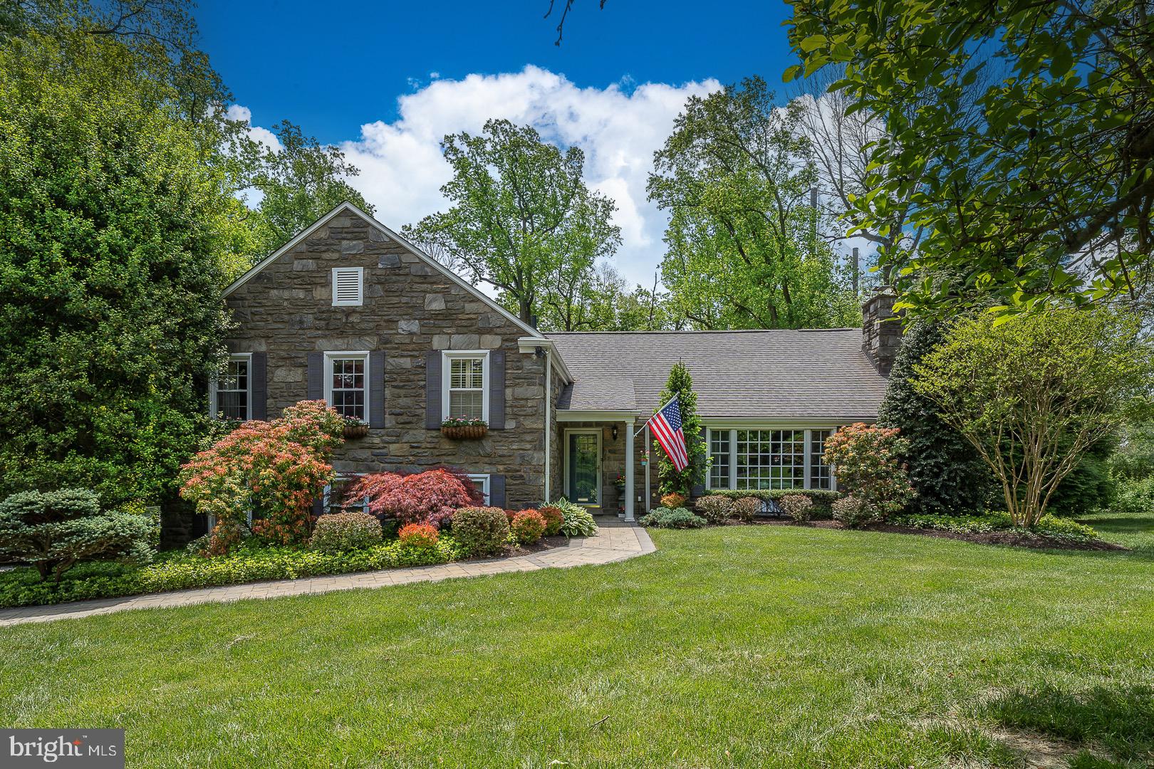 Only 1 Buyer will have the opportunity to make this Superb Setting their own! A rare find in Radnor Township, it is perfect for any stage of life. Nestled at the end of a quiet cul-de-sac, sits this beautiful and spacious greystone split level. Step inside and you will be equally impressed with the size, updates, and remodeling of this classic Main Line home. A gourmet Kitchen, a main floor Great Room addition, and a sumptuous Primary Suite are just a few of the many amenities the interior of this lovely home offers. Outside, there are Expansive Patios for entertaining and an In-ground Swimming Pool and Hot Tub. Surrounded by beautiful perennial gardens, flowering shrubs, and a wooded landscape adjacent to Overbrook Golf Club, this is truly an oasis. A whole house Generator is included so you will never be inconvenienced by Mother Nature. The flexible floor plan allows for easy expansion to 4 or 5 Bedrooms. Don't pass this up you may not have another chance!
Showings will begin Tuesday 5/23