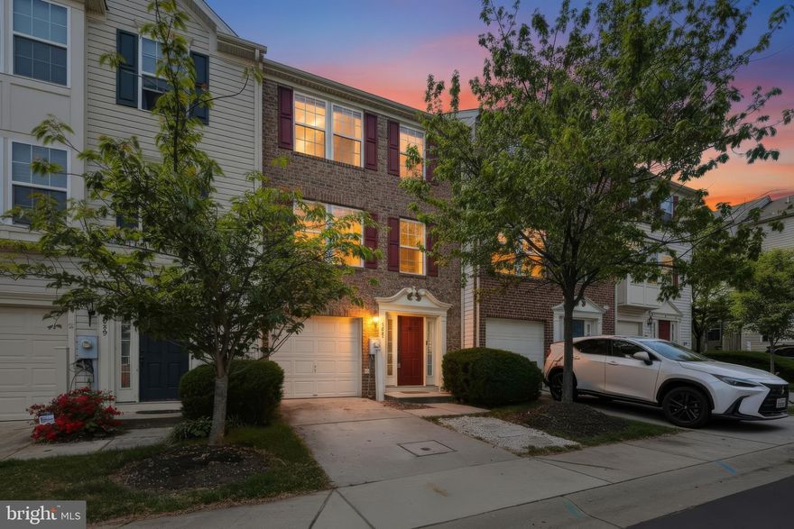 OPEN HOUSE: Saturday 4/25 1:00-3:00pm!  Welcome to 7061 Holly Springs Ln - a beautifully maintained 3-bedroom, 2.5-bath townhome located in the highly desirable Village Towns community in Elkridge, offering comfortable living, thoughtful updates, and a convenient location close to major commuter routes.  The entry level welcomes you with a bright foyer and a spacious rec room—perfect for a home office, gym, playroom, or additional living space.  The main level features an open and inviting floor plan highlighted by hardwood floors and abundant natural light. The large family room flows seamlessly into the dining area and well-appointed kitchen, complete with granite countertops, tile backsplash, and a pantry.  A charming living room/sunroom provides a perfect spot to relax or entertain, and a convenient half bath completes this level.  Upstairs, the primary suite offers vaulted ceilings, a walk-in closet, and a comfortable sitting area, along with a spacious en suite bath featuring a dual vanity, soaking tub, and separate stall shower.  Two additional bedrooms and a full hall bath provide plenty of space for family or guests.  Enjoy outdoor living on the Trex deck, ideal for morning coffee or evening gatherings. Additional highlights include a 1-car garage and a brand new roof (2025).  Residents of Village Towns enjoy low-maintenance living, with the HOA covering snow removal, lawn maintenance, and exterior maintenance. Ideally located in Elkridge, this home offers easy access to major commuter routes, shopping, dining, and everyday conveniences.  Schedule your tour today!