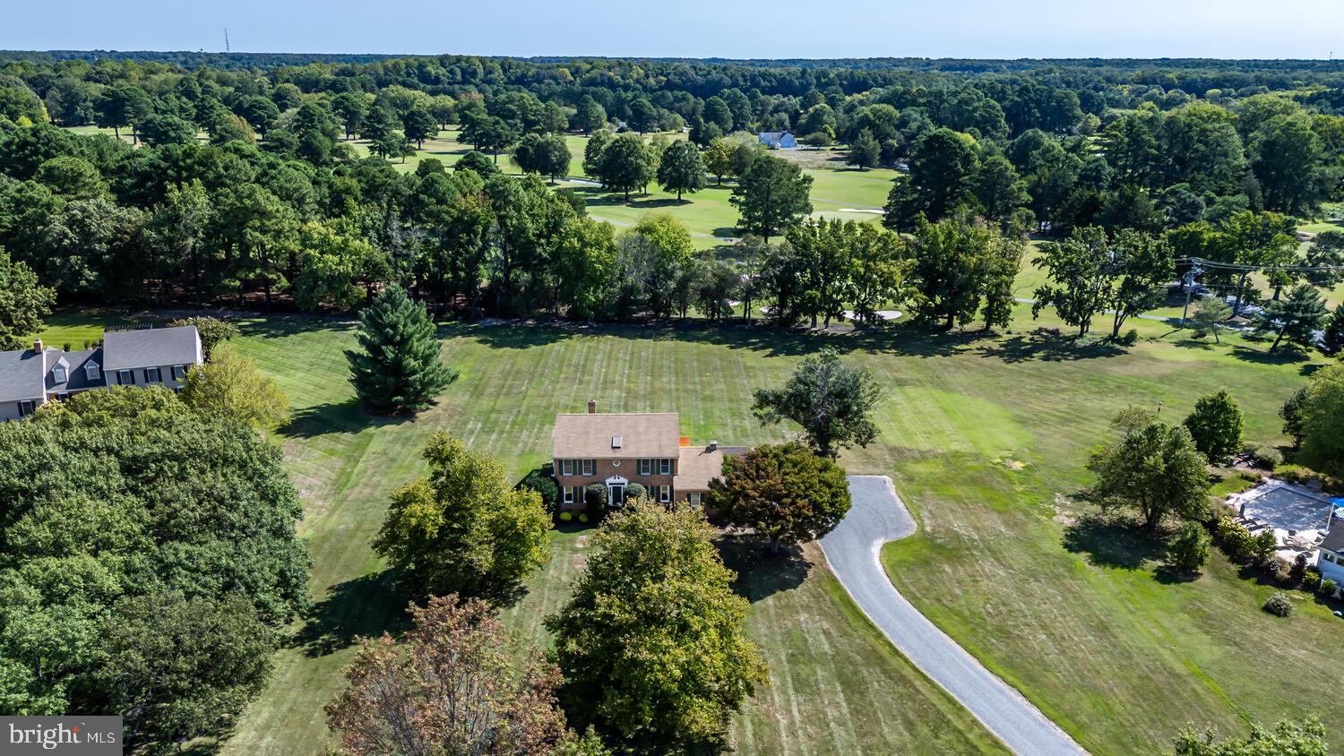 Great house in a great location with a great new price! This beautiful 2 story 4 Bedroom, 2.5 Bath brick colonial on the 13th fairway of the Talbot Country Club golf course has been very well maintained. Highly sought after location just off the Oxford Rd corridor on a private lane minutes from Easton and Oxford. Ample room and a gorgeous rear deck for indoor and outdoor entertaining. Large Family Room with gas fireplace, separate Living Room, Dining Room, and eat-in kitchen. Primary Bedroom with sitting room overlooking the Family Room. Newer Kitchen and roof.