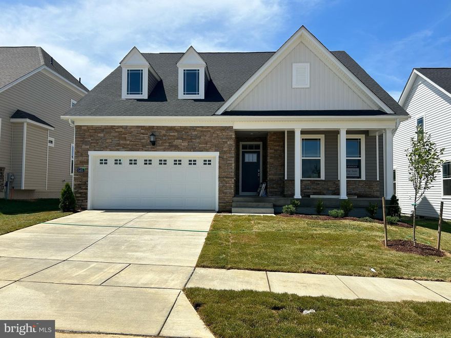 Active Adult 55+ Community.  Move-in Ready Home! The welcoming kitchen is part of the home's open-concept interior, complete with wrap around countertops, stylish cabinetry, upgraded kitchen package with double-wall ovens and stainless-steel hood. The kitchen island adds counter space in addition to bar-style seating. Tucked adjacent to the kitchen is a dining area, surrounded by windows for ample natural light. The Great Room is the home's natural gathering area, providing a comfortable space to relax and watch movies.  

The owner's suite makes for the ultimate retreat and includes a large bedroom, bathroom and walk-in closet. Dual vanities in the bathroom compliment busy lifestyles. In the bathroom, a water closet provides privacy while the walk-in closet offers ample storage space. A full-sized bathroom is located between the two secondary bedrooms and is accessible off the foyer. With three bedrooms in total, this home provides space for anyone in search of extra space. A laundry room helps keep the home clean and tidy, providing a space to do chores and keep mess out of sight. The finished lower level provides a world of opportunities and could be used as a game room, living room or anything to suit the home owner's needs...plenty of space and offers versatility. There’s a full bathroom and walkout exit to the fenced backyard. 

The community features a clubhouse, pool, pickle ball courts and much more! This home won't last long! Call today for a private tour!