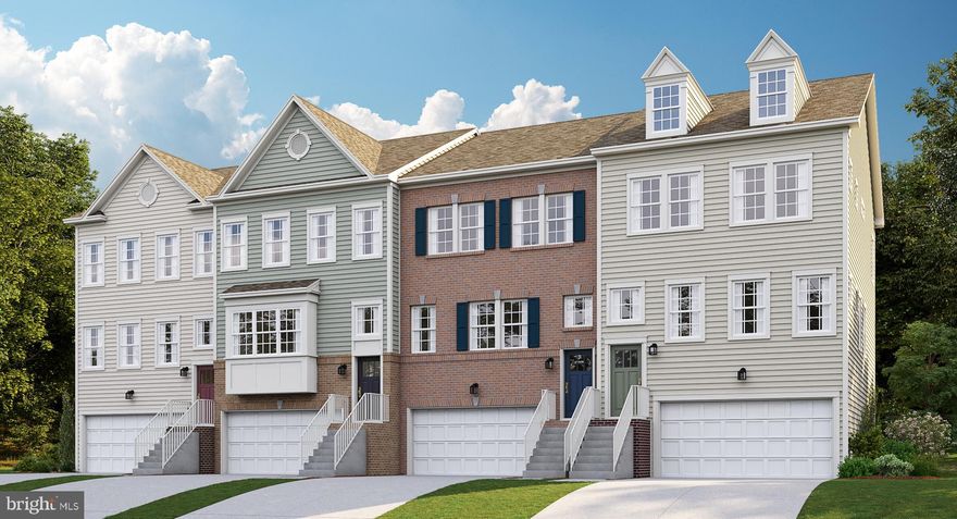 The Ellicott will be ready for a November move in date! Enjoy the views of the tree line behind your New Home.  This three-story townhome is the largest plan in this collection. The first floor features a two-car garage and a spacious recreation room, while upstairs is an open space family room, kitchen and dining room, with an optional deck for outdoor living. All three bedrooms are situated on the third floor.  Photos are for illustration purposes!