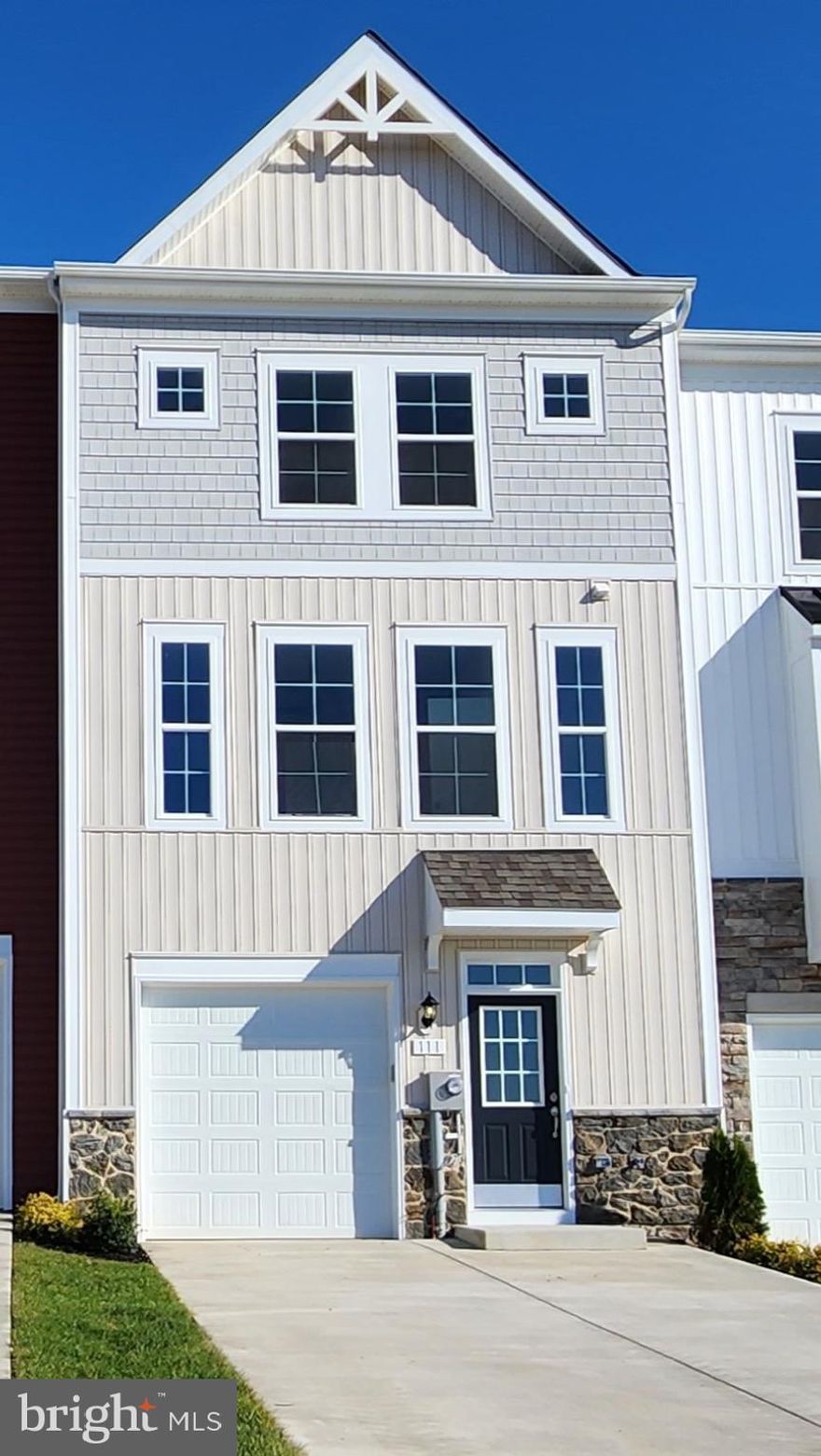 Fall Delivery in Berkeley County’s premier planned community featuring a clubhouse, swimming pools, walking trails, lush landscaping and mountain views. The Darlington II with partial stone front, 3 level townhome with 1 car garage featuring a Craftsman style front with 3 Bedrooms and 3.5 Baths. The covered front porch leads directly through the front door into the spacious lower level including 9 ft. ceilings, foyer with a double coat closet, access to the garage continuing into the fully finished lower level recreation room with full bath and walkout access to rear yard with privacy fence on both sides. This home features a 3 level morning room extension. Open concept main level with 9 ft. ceilings, luxury vinyl plank flooring throughout this level, dining room and kitchen with stainless appliances, large 8’ plus island, Mission style white cabinets, Pearl Jasmine quartz countertops, that leads directly into living room with powder room. The primary suite includes a tray ceiling, large walk-in closet, dual vanities with blanco maple quartz countertops with soaking tub and tiled shower in owner’s bath. Laundry is located on the bedroom level. Home and community information, including pricing, included features, terms, conditions, availability and sales procedures related to appointments subject to change without notice. All images are for illustrative purposes only and individual homes, amenities, features, and views may differ. Images may be subject to copyright. ***OFFERING UP TO $6500 IN CLOSING ASSISTANCE WITH THE USE OF PREFERRED LENDER AND TITLE***CONTACT CO-LISTING AGENT FOR ADDITIONAL INCENTIVES.