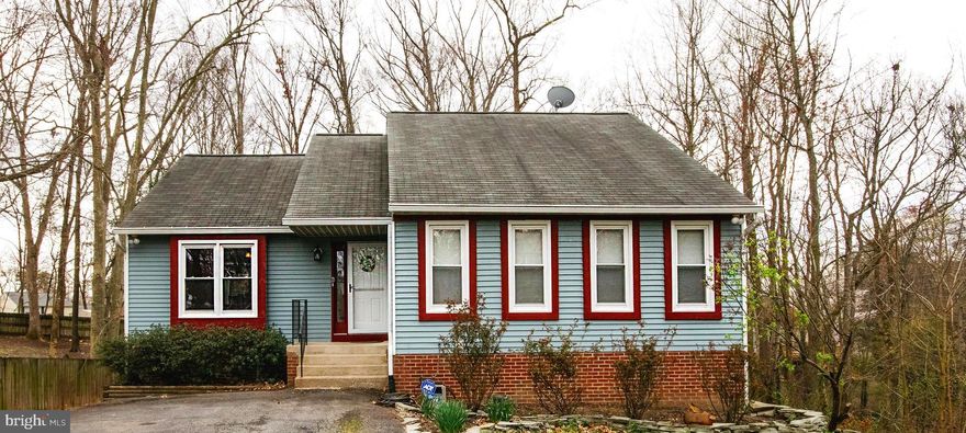 No HOA ! Close to Everything! Soaring cathedral ceilings, super high-end kitchen renovation w/Jenn Air & Bosch appliances, granite & gorgeous custom cabinets. Fully remodeled baths with custom tile, furniture vanity, seamless shower doors & new fixtures. Fully finished basement w/rec room, full bath, legal bedroom & den and extra bonus room. Large tiered deck & screened room w/speakers look over private wooded yard. Enclosed screened porch off the master bedroom for relaxation and enjoyment.  Minutes to restaurants and Stafford Marketplace shopping. Great commute to Quantico, Virginia Railway Express (VRE), and Washington DC and famous attractions.