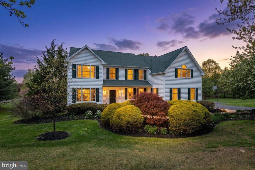 Welcome to this exceptional traditional Colonial, gracefully set on 2.5 private acres in highly desirable Buckingham Township and the award-winning Central Bucks School District. Ideally located just minutes from Cold Spring Elementary (approximately a 3-minute drive), this home offers both convenience and an exceptional lifestyle. Nestled into a picturesque setting, this home offers the perfect balance of privacy and lifestyle - just a short stroll to Hansel Park, where open fields, year-round activities, and summer concerts create a true sense of community.
A charming front porch welcomes you into a dramatic two-story foyer. To the left, the sun-drenched living room showcase elegant crown molding and wainscoting, flowing effortlessly into the formal dining room with serene backyard views. To the right, a private office with French doors and custom built-ins offers an ideal work-from-home retreat.
Designed with both comfort and entertaining in mind, the expansive kitchen is filled with natural light and features a large center island, gas cooktop, and abundant cabinetry and counter space. The adjoining sunroom provides the perfect setting for casual dining. The kitchen opens seamlessly to the inviting family room, highlighted by a cozy brick gas fireplace and a convenient rear staircase to the second floor.
The main level is completed by a laundry room with access to the three-car garage and a powder room.
Upstairs, the luxurious primary suite is a true sanctuary, complete with a versatile sitting room—perfect for a home office, gym, or dressing area—a walk-in closet, and a spa-like bath featuring a double vanity, soaking tub, and oversized walk-in shower. Two spacious bedrooms share a Jack-and-Jill bath and offer charming built-in window benches overlooking the backyard, while two additional generously sized bedrooms and a full hall bath complete the second level.
The finished walkout basement expands your living space with dedicated areas for work, fitness, and recreation, along with a powder room and direct access to the backyard. An unfinished section provides ample storage.
Step outside to your private outdoor oasis, where the pool was completely renovated in 2024 with all-new plaster, tile, and coping, along with a saltwater conversion for enhanced comfort and easy maintenance. The grounds are further enhanced by new hardscaping with a sitting ledge, professional landscaping, and a split rail fence. The two-tiered deck off the sunroom is ideal for entertaining or unwinding—enjoy morning coffee or evening cocktails while taking in beautiful sunset views and the sounds of summer concerts drifting over from nearby Hansel Park. For added peace of mind, the home is also equipped with a whole-house generator.
Ideally located within two hours of New York City, Philadelphia, the Jersey Shore, and the Pocono Mountains, and just minutes from shopping, dining, and charming destinations like Doylestown, Peddler’s Village, and New Hope, this remarkable property offers space, style, and an unbeatable location. Don’t miss your opportunity – make it your home!