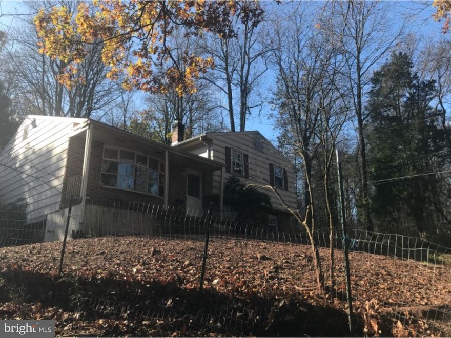 Private oasis ready for new owners!  Come have a look at this Twin Valley Single on almost 2 acres and bring your ideas to make this home sweet home. This property boasts hardwood floors, wood stove, rear deck and a one car garage.  Property being sold as is, no SDS, corporate addendums apply.  Buyer is responsible for any municipal inspection/repairs as required.  Call today for your personal tour.