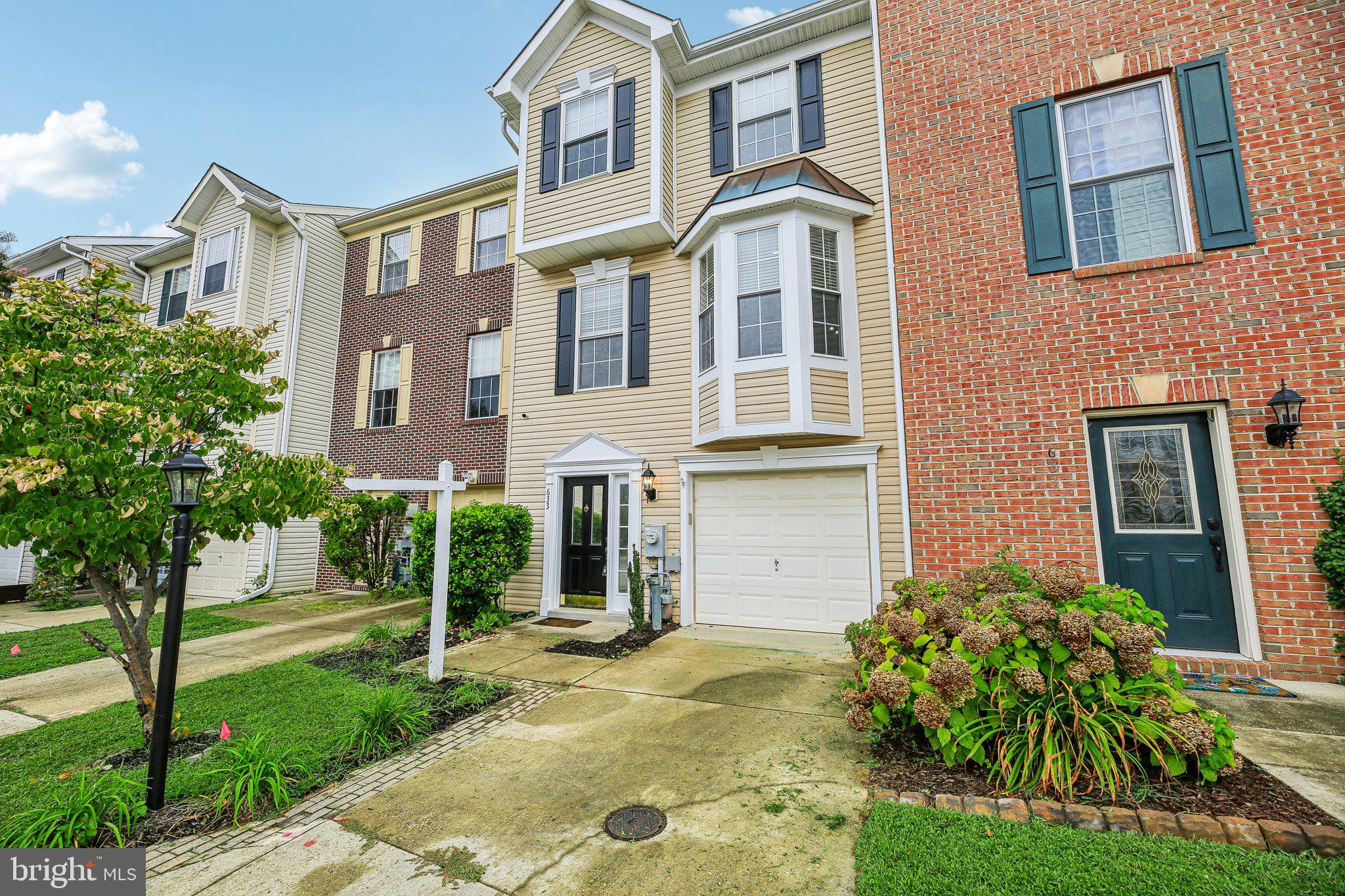 Also listed for Sale. Welcome to easy living on the Broadneck Peninsula! This three-level garage townhome blends comfort and flexibility with ample space to gather or unwind. The entry-level offers a versatile space—use it as a legal 4th bedroom, theater, office, or hobby room—plus a garage with extra storage for a workbench, gear - it even comes with a second fridge. Upstairs, the heart of the home is the stylish kitchen with granite counters, stainless steel appliances, including a Bosch dishwasher and newer refrigerator/freezer, and a movable island that makes entertaining effortless. A wall of pantry storage keeps everything organized, while the slider opens to a sunny deck and fenced yard—perfect for cookouts, gardening, or evenings under the stars. The open living and dining areas flow together, creating an inviting space for friends and family. Retreat upstairs to three bedrooms, including a serene owner’s suite with a walk-in closet and updated bath. Two additional bedrooms and a hall bath complete the home, offering space for everyone. Beyond the front door, enjoy an easy commute to major routes while being part of the coveted Broadneck community, home to Blue Ribbon Schools, parks, shops, and the Chesapeake Bay. And very close to the almost finished Broadneck Peninsula Trail!