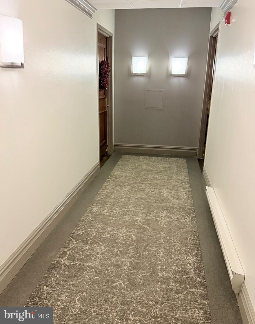 An awesome apartment for those appreciating privacy and space.  Located on the ground level of the Promenade, this is a one of a kind unit.  A private parking area is just outside the entry to the two units on this level.  Reserved indoor parking is just steps away.  Access from the lobby does require stairs accessed from the Arcade Level.  This unit is oversized with tall ceilings, a large balcony, abundant closet space, luxury vinyl plank floors, stainless appliances and granite tops.  The unit is bright and light filled.  For the right person, this is a fantastic unit.