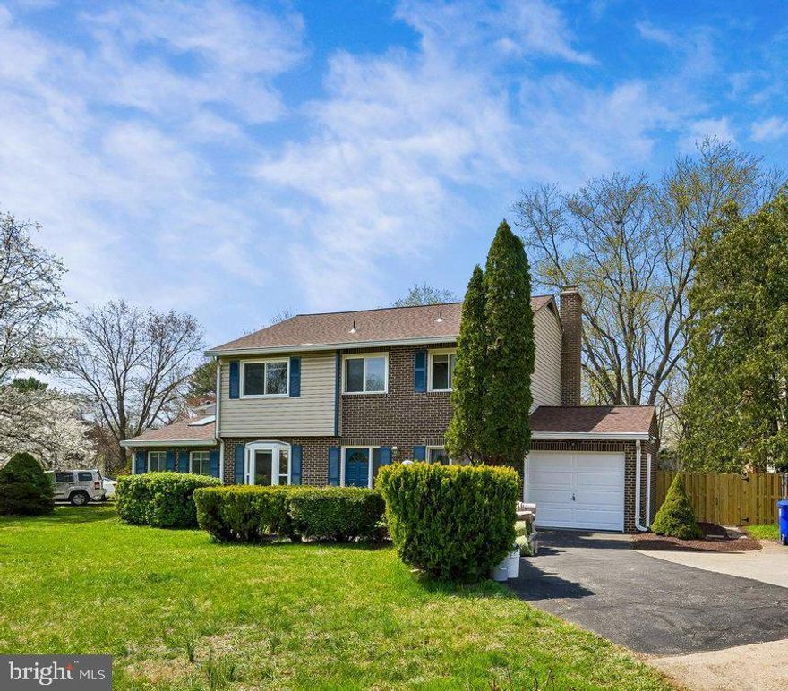 Welcome to 17720 Millcrest Drive, where timeless comfort meets everyday convenience in one of Derwood’s most established neighborhoods.
Set on a sunny corner lot framed by a brand‑new privacy fence, this thoughtfully updated home invites you in with stone accent wall,  warm hardwood floors and light‑filled living spaces with bay window designed for both relaxation and connection. The renovated eat‑in kitchen serves as the heart of the home, complete with granite countertops, glass tile backsplash, and an inviting breakfast area anchored by a charming fireplace—an ideal space for slow mornings or casual gatherings.
A rare main‑level bedroom with skylights offers flexible living options for guests, remote work, or multigenerational needs. Upstairs, four generously sized bedrooms each with a ceiling fan and large windows and walk‑in closets provide private retreats, while renovated baths and fresh finishes throughout create a true move‑in‑ready experience.
Outdoors, enjoy a level, fully fenced backyard with room to entertain, garden, or unwind—plus a newer storage shed and patio for seamless indoor‑outdoor living. With major systems already updated and no HOA restrictions, this home delivers peace of mind and lifestyle freedom.
Moments from scenic parks, recreation centers, Metro access, and Rockville Town Center, this is suburban living at its most convenient—and most comfortable.
