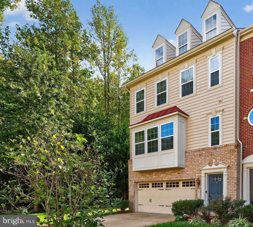 New Price - Great Value, Huge Townhome! Sensational Living W/Hardwood Floors all three levels in this Captivating Retreat in Cul-De-Sac with a Private Vibe and Wooded Rear View. This amazing Well-Maintained Home features beautiful Hardwood Floors on all three levels with ceramic tile landings on the lower level. This Home features a Perfect Secondary Suite (4th Bedroom) or Entertainment Oasis. The main level is spacious, it feels open and inviting.., just add your decorative flair.  The open kitchen includes a double oven and 42" cabinets, granite and island with storage. The extra bump out enhances the space with morning room vibes. The bedrooms are  all so charming and comfortable with hardwood floors. The desirable Primary Suite boasts  a seating area, tray ceiling and two walk-in closets, en suite with a soaking tub, double vanity and separate shower.  This town home has more... a huge Deck that feels secluded for relaxing with nature and enjoying some serenity day or night. The backyard offers a stone Patio with wall seating and a  Fenced Yard.  Beechtree is a Great, Fun-Filled, social community with much to offer with many activities  and amenities including a Community Center and an Award Winning Golf Course. Check it out... Now!!!