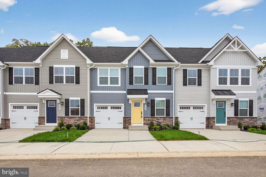 Welcome to this stunning, newly built townhome in the highly sought-after Alexander’s Crossing community. This spacious, never-before-lived-in home features 4 bedrooms, 3 full bathrooms, and 1 half bath, offering a perfect blend of modern style and comfortable living. Main level features a bedroom with a private bath plus an additional half bath, an open-concept layout with a spacious family room, and a gourmet kitchen with a large center island. The bright dining area opens to a screened-in (to be installed), covered back porch overlooking wooded views, providing privacy and serene outdoor living. The primary suite offers a double vanity, walk-in shower, and a generous walk-in closet with tranquil wooded views. A full laundry room with washer and dryer is conveniently located on this level for maximum ease.  Upper Level has Two generously sized bedrooms, a full bathroom with modern finishes, and access to attic storage plus a small office/closet area for added flexibility. Walkout Basement Features a fourth bedroom, full bath, and a living area that opens to a covered porch, plus a large unfinished space for storage or workspace. Extra Features include a EV-ready garage with dedicated plug for electric vehicle charging andTrash collection and lawn mowing are included in the HOA, making living easy and maintenance-free. 
Community Amenities include Parks, tot lots, and pickleball courts. Easy access to Routes 1, 17, I-95, and VRE, plus minutes to Cosner’s Corner, Central Park, and Downtown Fredericksburg. No smoking allowed. Pets considered on a case-by-case basis.
