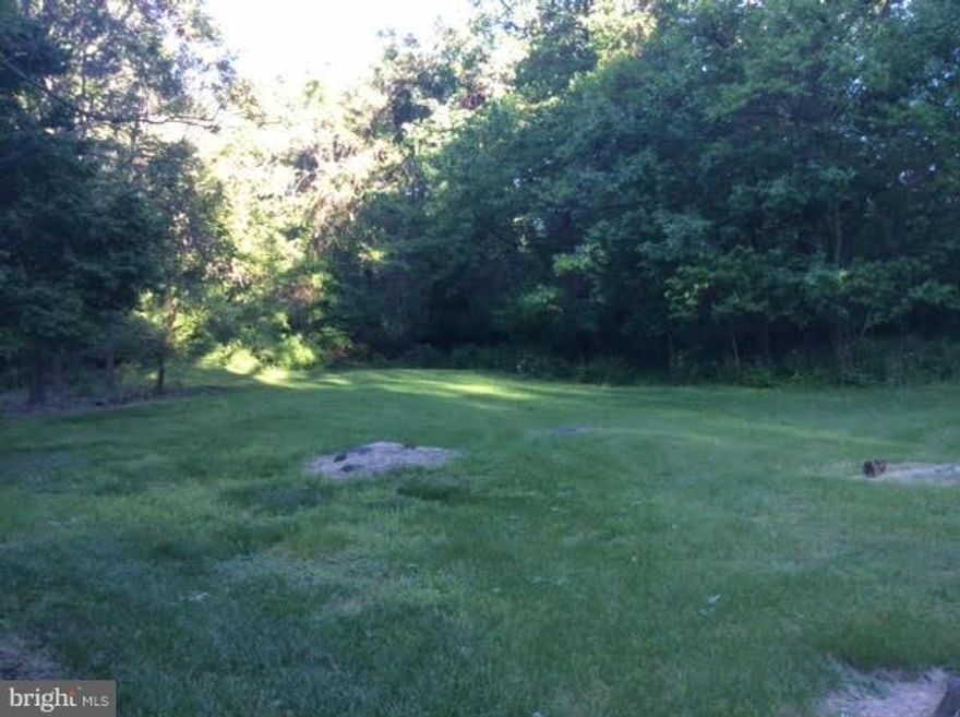 2.2 acre level building lot, partial clearing with surrounding trees.  Parcel is approved for mobile, modular or custom home.  Bring your builder/architect!  No HOA, restrictions or builder tie-in.  Convenient to I-95, APG and southern PA.  Lot was previously perced and approved.