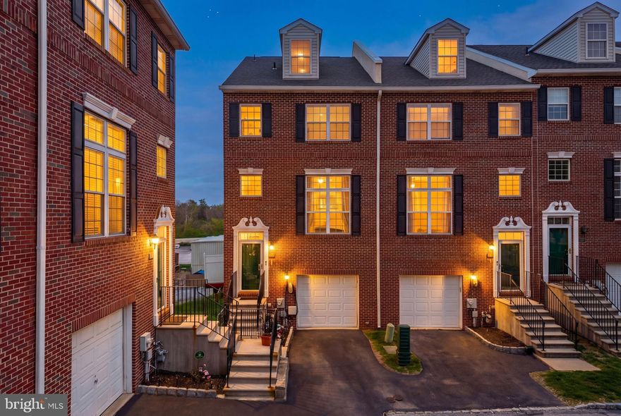 Step into the warmth of this beautiful end-unit home in Freedley Square, where sunlight and cherry hardwoods create an immediate sense of "home." Imagine hosting cozy dinner parties centered around your granite wet bar, or preparing morning coffee in a sun-drenched kitchen that opens directly to your private deck. It’s the perfect sanctuary to unwind and toast to another beautiful Conshohocken sunset.

Your primary suite is a true retreat, featuring a spa-like bath with a deep soaking tub and a professionally organized closet that brings a sense of calm to your daily routine. Whether you’re relaxing in the airy guest suite or enjoying your favorite playlist through the built-in surround sound, every corner of this home is designed for comfort and effortless living.

The versatile third-floor loft offers a peaceful escape for a home office or a quiet third bedroom, complete with its own bathroom and climate control. With a hidden second basement for all your treasures and the vibrant energy of Conshohocken just steps away, this is more than just a house—it’s the lifestyle you’ve been dreaming of.

This well-appointed home also includes a dedicated Tesla charger, offering seamless electric vehicle charging right from your own garage

Enjoy the prime location with this perfectly situated home, just a short stroll from Fayette St. with vibrant shops and local dining favorites. Close proximity to Schuylkill River Trail, and Conshohocken train station for an effortless commute. Experience this beautiful home in person- schedule your private showing today.