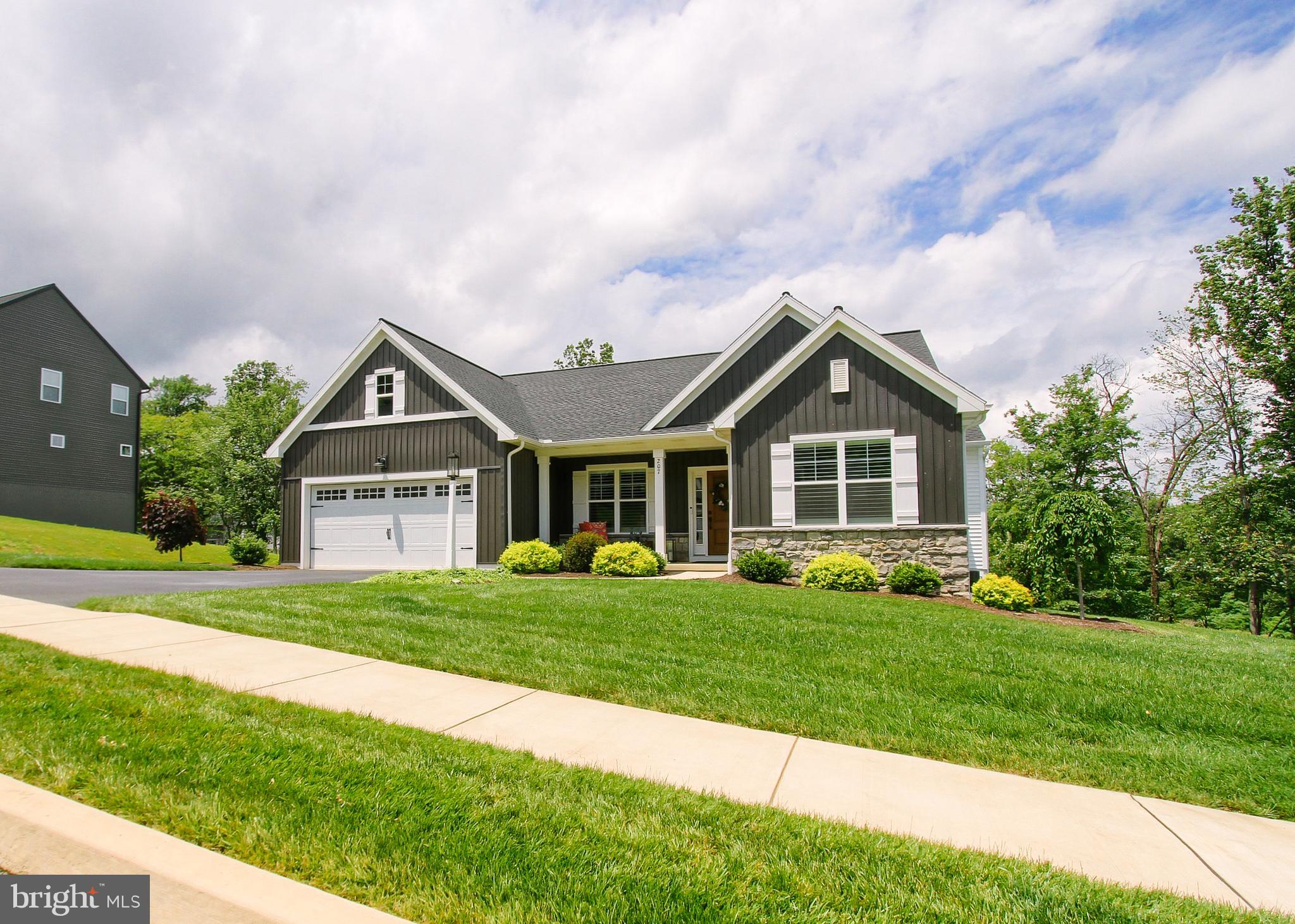 Welcome to 207 Rockville – A Former Model Home in Rockville Estates.
This beautifully maintained, single-story home is a rare gem, packed with high-end upgrades and thoughtful details throughout. This home showcases exceptional craftsmanship and design in every corner.
Step inside to find 3 spacious bedrooms, 2 full baths, and a private study — ideal for remote work or a quiet reading space. The open-concept layout features engineered hardwood floors, upgraded carpeting and lighting, and elegant plantation shutters. Cathedral ceilings in the family and dining rooms enhance the sense of space and light, anchored by a stunning stone fireplace with gas insert, oversized mantel, and a dramatic shiplap accent that extends to the ceiling.
The expanded chef’s kitchen is a true showstopper, with quartz countertops, glass-front cabinetry, a large center island, and upgraded GE appliances. A walk-in pantry adds extra convenience and storage.
Retreat to the luxurious primary suite with an inlaid wood tray ceiling, dual walk-in closets, and a spa-inspired en-suite bath featuring a full tile shower, Corian countertops, dual sinks, and ceramic flooring.
The walk-out finished basement offers even more living space, perfect for entertaining or storage. Outside, enjoy serene river views from your upgraded TimberTech deck with privacy wall, overlooking a wooded rear lot that offers both tranquility and seclusion.
Custom paint, premium finishes, and thoughtful upgrades throughout make this home a true standout. Don’t miss your chance to live in the heart of Rockville Estates with nature at your doorstep and elegance at every turn.