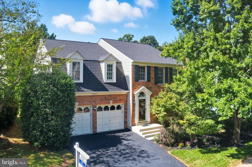 Well maintained and beautiful NV Homes Madison model, 3-level home with brick front located right across the street from Lowes Island elementary. Your children can walk to school! Total 3728 sq. ft finished living space on 3 levels. Fully finished basement with lots of extras.  2-car garage with freshly painted garage floor and freshly paved driveway with ample space for additional parking on street side.  Great Location and Neighborhood in sought after Lowe’s Island. 
Main Level: Two story-foyer with two columns. Living room with crown molding and library area with window sitting.  Separate formal dining room with crown, chair & chandelier moldings. Vaulted-ceiling family room off of kitchen with brick fireplace and French doors opening to brick patio. Kitchen with 42 inch cabinets, pantry and recessed lighting. SS French door refrigerator with two freezer drawers. Powder room with tile floors and laundry room with window. 
Upper level: Four bedrooms with two full baths. Main bedroom suite with vaulted ceiling, two nooks with windows, two walk-in-closets, stand up shower, soaking tub, double sink and separate toilet. 
Lower Level: Recreation and media rooms with recessed lighting & built-in speakers, full bath, big oﬃce room with French doors and custom built-in book shelves, extra room with closet, wet bar with built-in wine rack & stone tiling, and ample storage. Brand new upgraded carpet throughout upper level and basement. Hardwood flooring in main level. Freshly painted whole house. New lights. Brand new quartz counter tops in kitchen. New kitchen faucet & disposer. New roof 02/2024(CertainTeed Land-mark Lifetime shingles). Entire siding replaced in 11/2019. HVAC/Heating furnace 12/2023 and AC 09/2019. 
Water heater 75 gallons capacity. Radon mitigation, Security system. 
***Price reduced 40k.  This one will not last long.
OPEN HOUSE Saturday 10/3/202025 FROM 10 AM -12 PM
OPEN HOUSE Sunday 10/4/202025 FROM     12 PM - 2 PM