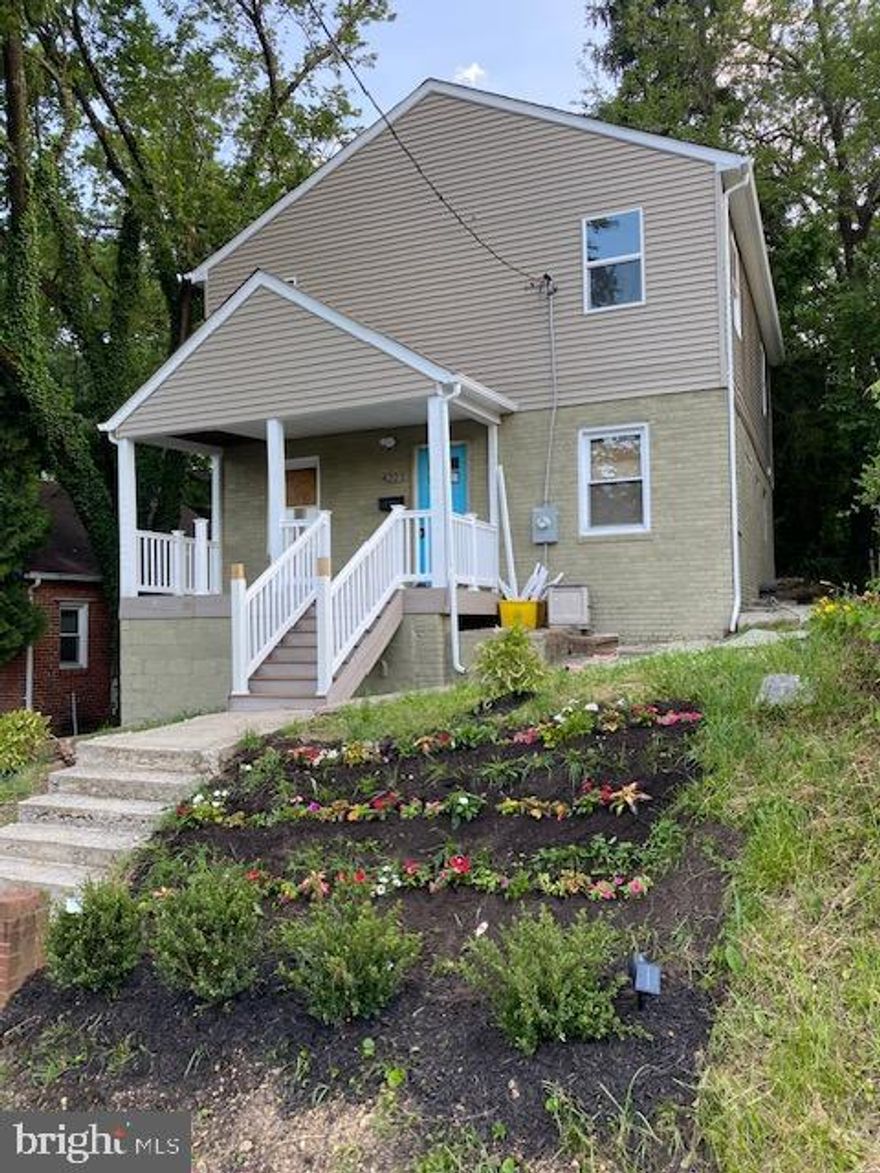 This  Beautiful Renovated property features  5BR/4BA close to the District of Columbia.  This gem has space for everyone.  Enter the main level with an open concept, upstairs  3BR/ 2BA wall to wall carpet, the basement is it's own oasis ready with an easy walk out entrance, kitchen , bedroom and bathroom to welcome quest, or generate revenue.