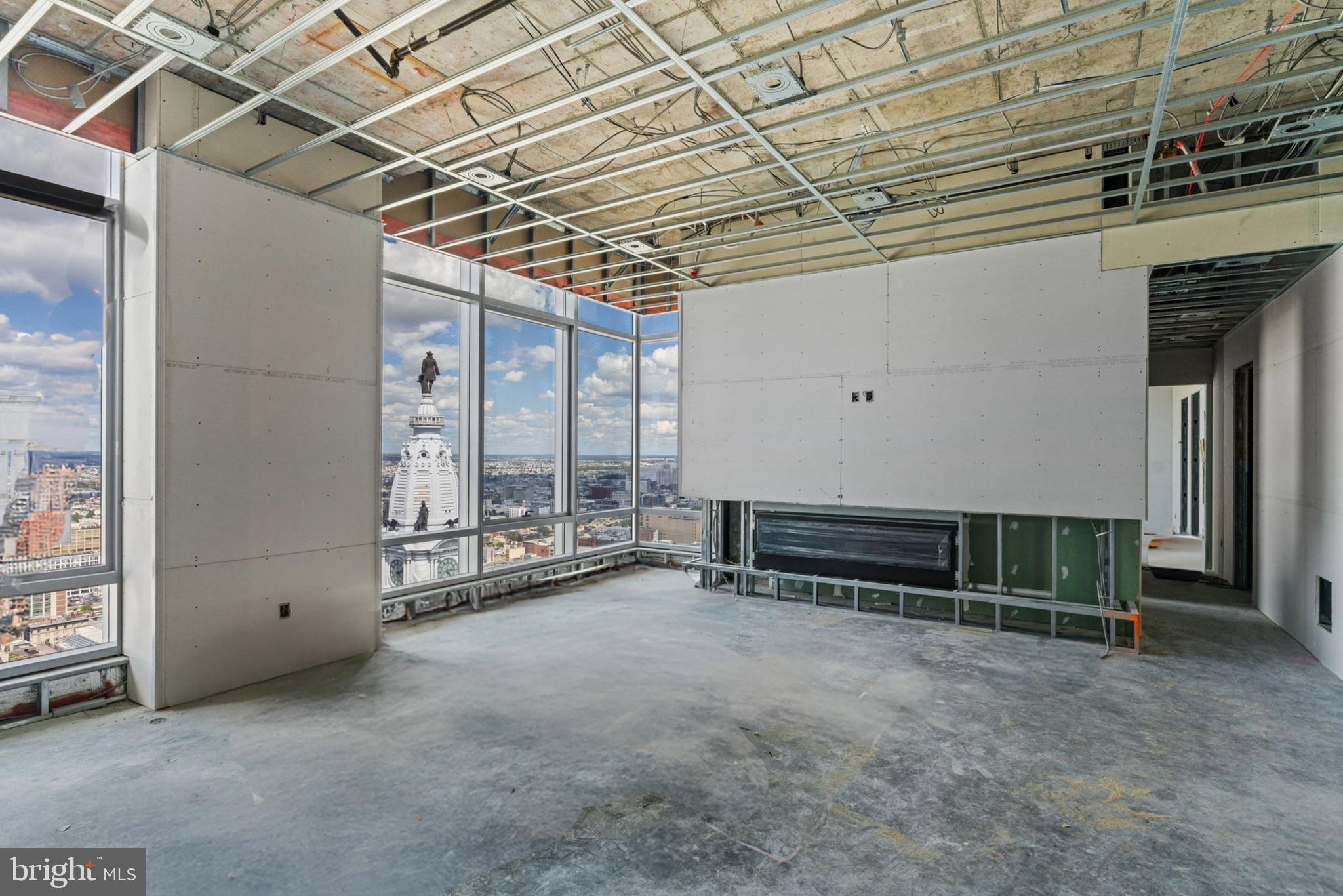 Secure your opportunity to purchase a substantially completed penthouse unit and customize your trophy penthouse at The Ritz Carlton Residences, Philadelphia. This stunning residence is ready to be completed with beautifully contemporary preselected finishes, or consult with our design team to create a space entirely your own. Once completed, PENTHOUSE 1C will be one of the most exceptional residences in the city, in an already iconic residential tower well regarded for its incomparable views, global resident benefits, white glove service, and best in class amenities such as hotel benefits, state of the art fitness center, pool, valet parking, media room, yoga room, newly constructed resident terrace with fire pits and lounge seating, and dog runs. Occupying the center portion of the northern floor plate on the 46th floor, PENTHOUSE 1C expands on these offerings by providing unobstructed views of the most coveted view in the building: Dilworth Park and William Penn atop City Hall, bespoke finishes, elegant and contemporary design unique to PENTHOUSE 1C, 13' ceilings, and a newly imagined resplendent common corridor, all as executed by esteemed local design and construction firms, Kaminski & Pew, and ASW Hobart. One valet parking license is included. Taxes and condo fees TBD.