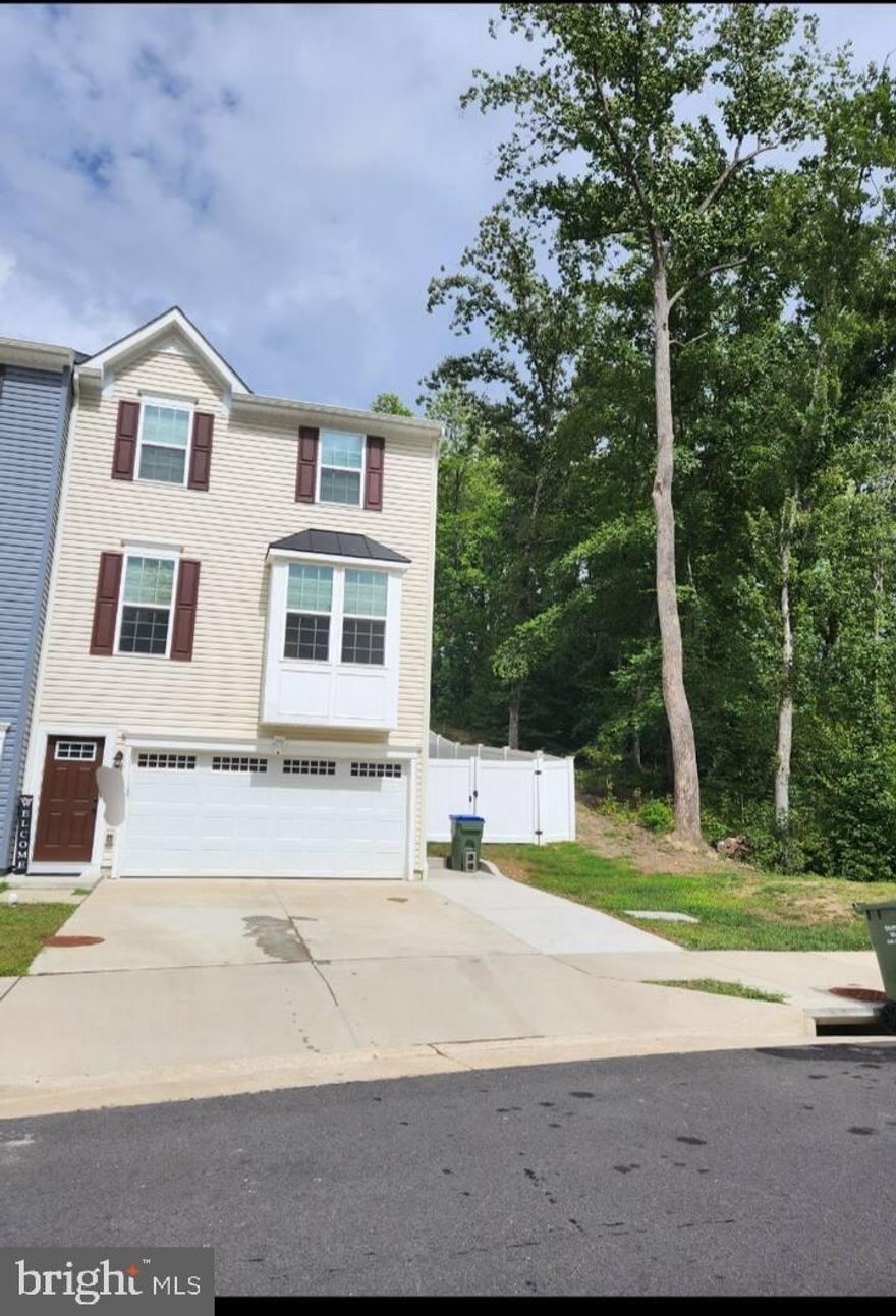 Furnished private basement suite available in end-unit townhouse in Stafford. Convenient to Interstate 95, Marine Corps Base Quantico, hospitals, shopping, and dining; 15–20 minutes to Fredericksburg and Woodbridge.

Suite features private full bath and kitchenette with microwave (air fryer/broiler/convection), Instant Pot, sink with disposal, and refrigerator (no dishwasher). Furnishings include queen bed, futon (twin), chair, nightstand, adjustable coffee/dining table, and 50” TV. Shared front entrance provides direct access to basement; no need to enter main living areas.  

Utilities included (with cap). Internet included.  Street parking. Shared fenced backyard with deck, patio, and fire pit. Portable washer/dryer on site; laundromat nearby. Prefer 1-year lease. No smoking Ideal for one occupant. No pets.  Renters insurance required. Upper levels separately secured and rented; two dogs reside upstairs.  Upstairs tenants rent the garage and driveway.

PLEASE DO NOT GO TO THE PROPERTY TO TOUR WITHOUT A CONFIRMED APPOINTMENT.  ALL TOURS MUST BE SCHEDULED THRU AN AGENT.

Listing agent has a financial interest.