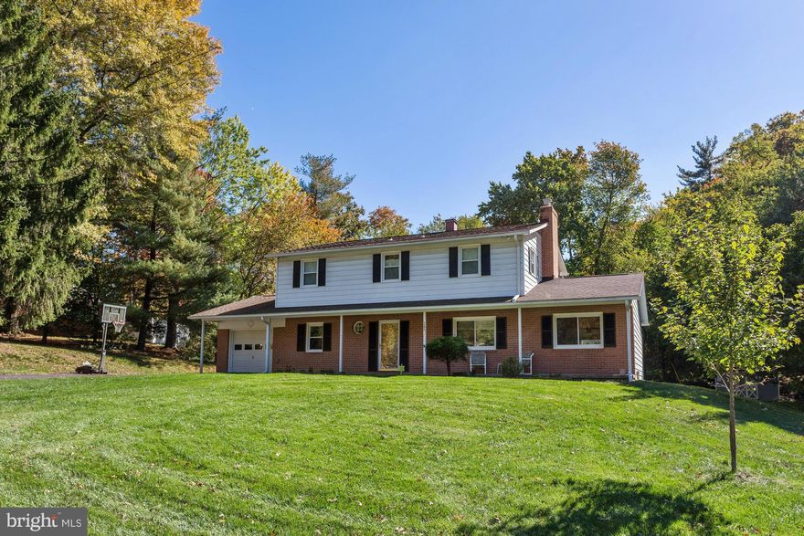 Spacious colonial nestled in the desirable Normandy Heights community. Two wood burning fireplaces& gleaming hardwood floors, this one will amaze you! Large updated kitchen w/granite counters, 42 inch cabinetry& SS appliances. Updates 2013-16: hot water heater, windows throughout, roof, oil tank, boiler, HVAC, interlock switch for generator, master bath, breaker panels, chimney caps, and driveway!