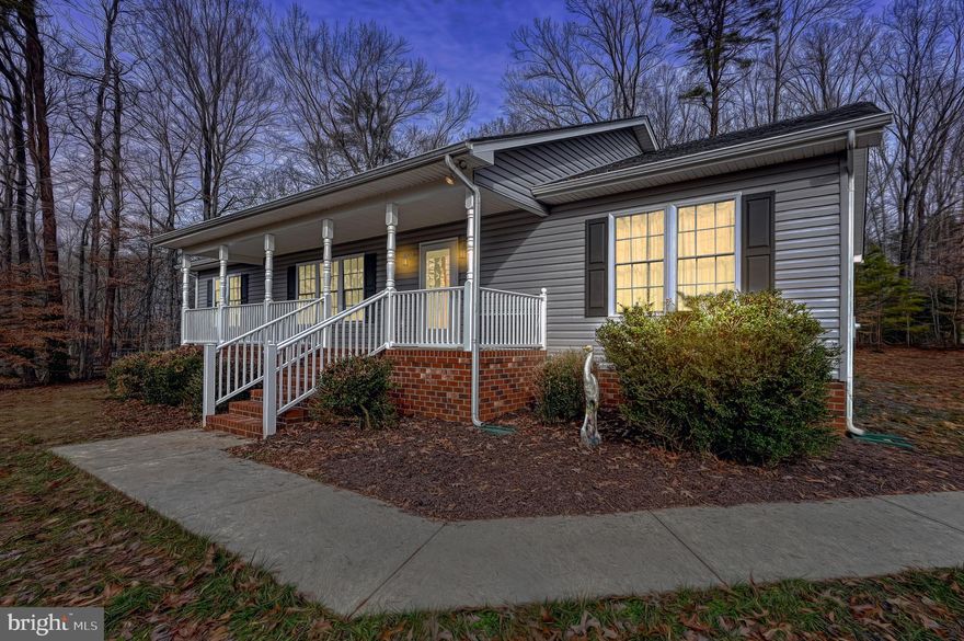 Welcome to your dream retreat at Lake Anna! This charming private side water access home offers a perfect blend of comfort and luxury, providing you with the ultimate lakeside living experience.

Key Features:

Private Side Water Access: Enjoy exclusive access to the tranquil waters of Lake Anna, offering a serene escape from the hustle and bustle of everyday life.

Deeded Boat Slip: Your own designated boat slip ensures that your watercraft is always ready for an adventure. Whether it's a peaceful cruise or an exciting day of water sports, the lake is at your fingertips.

Oversized Shed: Ample storage space for all your outdoor equipment, water toys, and more. Keep your lake essentials organized and easily accessible in this convenient oversized shed.

Spacious Bedrooms: With three bedrooms, this home provides ample space for family and guests. The cozy and well-appointed bedrooms offer a peaceful retreat after a day of lake activities.

Inviting Bathrooms: Two bathrooms provide convenience and comfort. Modern fixtures and thoughtful design create a spa-like atmosphere, enhancing your overall living experience.

Large Kitchen: The heart of the home, the kitchen boasts generous counter space and modern appliances. Whether you're a culinary enthusiast or just enjoy preparing meals for loved ones, this kitchen is designed to meet your needs.

Gas Fireplace: Cozy up on chilly evenings by the warmth of the gas fireplace. This elegant focal point not only adds ambiance but also serves as a gathering spot for family and friends.

Additional Features:

Outdoor Living Space: A well-appointed outdoor space allows you to savor the beauty of the surroundings. Whether it's morning coffee on the deck or evening barbecues, outdoor living is at its finest.

Natural Light: Sunlight floods the interior, creating a bright and welcoming ambiance throughout the home.

Don't miss the opportunity to make this Lake Anna haven your own – where every day feels like a vacation!