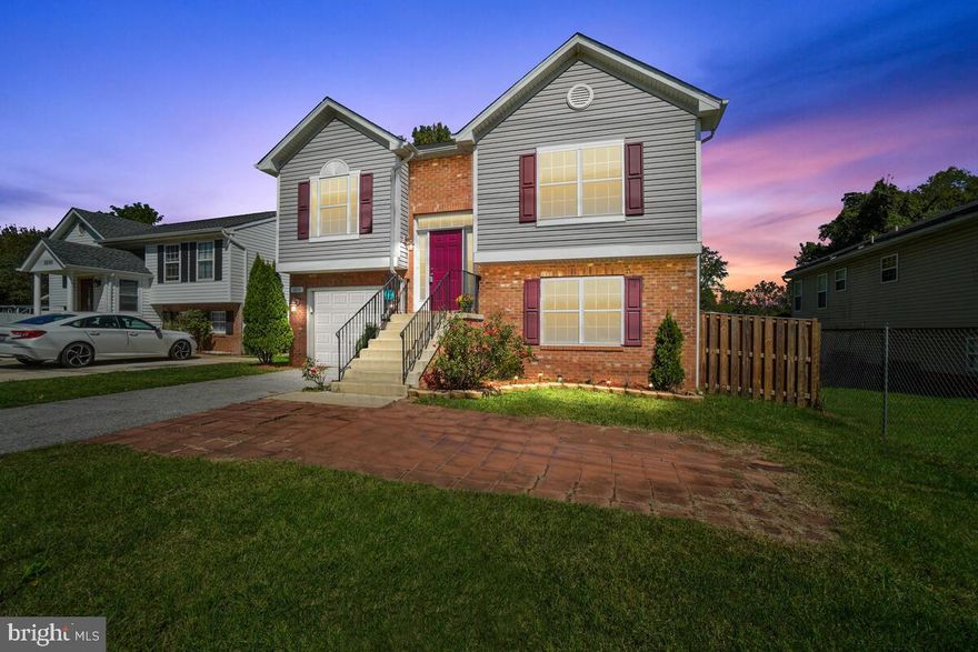 At just 10 years young, this home offers a perfect blend of contemporary and classic charm. As you step inside, you’re captivated by the warm embrace of gleaming hardwood floors in the foyer and staircase. The kitchen continues the hardwood, complemented by stainless-steel appliances and granite countertops. One of the kitchen's most eye-catching features is the sliding glass door, which floods the space with natural light and offers future access to your dream deck. Just imagine your own personalized outdoor retreat. The blank slate is yours to design! The upper level is a haven of comfort where you'll find a plush-carpeted primary bedroom with a private ensuite featuring a relaxing tub-shower and stylish vinyl flooring. Two additional guest rooms on this level also boast plush carpeting, creating cozy retreats. The hall bathroom, with its contemporary vinyl flooring and another tub-shower, provides convenience and style. The lower level is a treasure trove of possibilities, with a nicely sized family room displaying a cozy fireplace that is perfect for chilly evenings. The fourth bedroom can be used as an office or flex space and offers easy access to the backyard through a walk-out door. This level also includes access to the garage, a full bathroom, a utility closet, and a dedicated laundry room. You'll enjoy the benefits of a recently replaced HVAC system (2023) providing peace of mind for years to come while keeping your energy bills in check. The home has been thoughtfully adorned with walls painted in Agreeable Gray and bright white ceilings to provide a clean, bright canvas for your personal touch. Enjoy .2 acres of flat yard, and a fenced rear that awaits your activities. A useful storage shed is perfect for gardening tools, toys, or other items you want to keep neatly organized. This is a NO HOA community! Given the proximity to New Carrollton Metro Station, Washington DC, US-50 and I-495, this home offers prime accessibility for commuters. Nearby Vista Gardens Marketplace includes Chick-fil-A, Chipotle, Target, The Home Depot, Shoppers Food Warehouse, among many other options. Local parks include Folly Branch Park and Glenwood Park. Just steps away (literally 2 houses down!) you’ll find the Washington Baltimore & Annapolis Recreational Trail (WB&A Trail) that runs northeast through Prince Georges County past Bowie, MD to the Patuxent River. Don't miss your opportunity to make this gem your forever home.