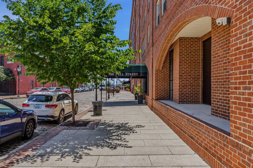 Welcome to Belt’s Landing, ideally situated on one of Historic Fells Point’s charming cobblestone streets! This sought-after waterfront community offers exceptional amenities including a 24-hour front desk, two community EV garage spaces, exercise room, outdoor pool with stunning water views.

This 2-bedroom, 2-bath condo features gleaming wood floors throughout, an updated kitchen with granite countertops, stainless steel appliances, and the rare convenience of TWO-CAR PARKING. The spacious primary suite offers a walk-in closet and a private bath with double sink vanity, separate soaking tub, and shower. The second bedroom and full bath provide the perfect setup for guests, family, or roommates.

Enjoy the very best of city living with Fells Point’s local shops, renowned restaurants, waterfront attractions, expansive waterfront Promenade and vibrant nightlife just steps from your door!
