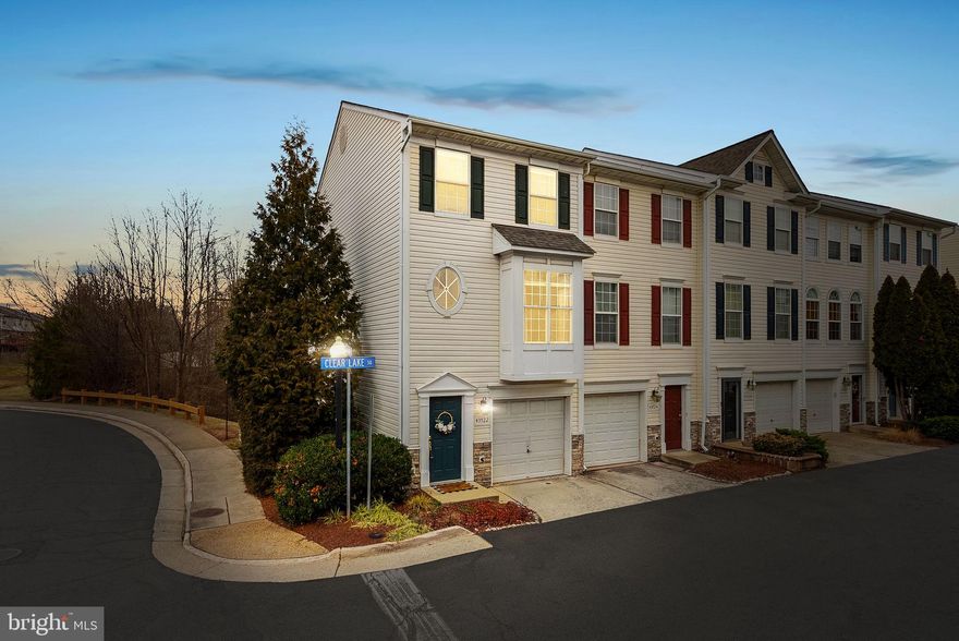 Welcome to this move-in ready, 3-Level, End Unit townhome-style CONDO, perfectly situated just around the corner from the Ashburn Metro Station in the quiet and friendly community of Hearthside at Flynn’s Crossing. With more than 1,600 square feet across three comfortable levels, this home offers the space and flexibility you've been looking for!

Step inside to a freshly painted interior and newer carpeting that make the home feel bright and welcoming from the moment you enter. The main level features hardwood floors throughout, a cozy living space, and a refreshed kitchen with brand-new Quartz countertops, microwave, dishwasher, and stove—ready for weeknight dinners and weekend hosting. Just off the kitchen, sliding glass doors lead to a private deck overlooking peaceful wooded views, creating the perfect spot to unwind with a cup of coffee or enjoy a quiet evening outdoors. A convenient half bath completes the main level.

Upstairs, you’ll find 2 spacious bedrooms, and 2 full bathrooms,  offering comfort, privacy, and a great setup for roommates, guests, or a home office. The lower level adds even more versatility and can be used as a cozy rec room, guest space, or 3rd bedroom, complete with a private full bathroom and laundry area. A one-car garage plus one assigned parking space make daily life easy and stress-free.

The location truly shines—tucked away yet close to everything. Enjoy nearby shopping, dining, and entertainment at One Loudoun, Ashburn Village Center, and Broadlands Marketplace, along with easy access to Route 7, Route 28, the Dulles Greenway, and major commuter routes. Whether you’re heading to work, meeting friends, or running errands, everything is just minutes away.

Warm, welcoming, and wonderfully convenient—this is a place you’ll be proud to call home.