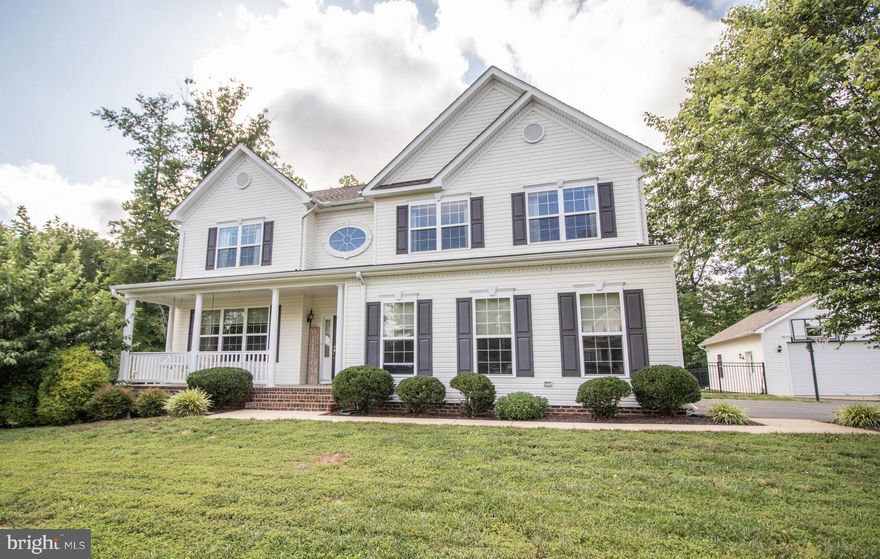 Best Summer Ever! This gorgeous Grandview Haven Colonial features an in-ground, low-maintenance saltwater pool ready for you to take a dip! With more than 4000 finished square feet, this 5 bedroom, 3.5 bath, Belmont model has room for everyone! Beautiful Bamboo hardwood flooring greets you in the two-story foyer and continues through the main level. The eat-in kitchen is a chef's delight with granite counters, gas cooktop, double wall ovens, Maple cabinets, new stainless appliances and island with breakfast bar. Kitchen is open to the roomy family room with 2' extension. Get cozy by the gas fireplace on a chilly night or head out to the back deck to enjoy a nice day under the pergola. Crown molding and wainscot dress up the formal dining room that flows into the formal living room that also makes a great home office. Love your cars? Then you'll love the oversized 2-car attached garage that'll fit a full-size truck and the 20x30 detached garage with electric, door opener and room for a workshop! Heading upstairs, the wrap around landing leads you to four spacious bedrooms and shared hall bath. The huge primary bedroom includes double walk-in closets and double vanities in the attached bath with a soaking tub and amazing tiled shower with double heads! Heading downstairs, the newly-carpeted lower level offers a fifth bedroom that could be used for guests, office or play space and a media room where the screen and projector convey. The game room walks out to your private oasis with attractive stamped concrete surrounding the heated saltwater pool with sun shelf! The lower level full bath makes for easy pool access and changing after a swim. Out back, the yard continues past the pool fence to a wooded tree line that provides privacy and room to play. Don't miss the tree house! A cute front porch with swing, a convenient mudroom/laundry on the main floor, pre-wired surround sound and generator plug-in are finishing touches that make this beauty one that you will not want to miss. Schedule your showing today!