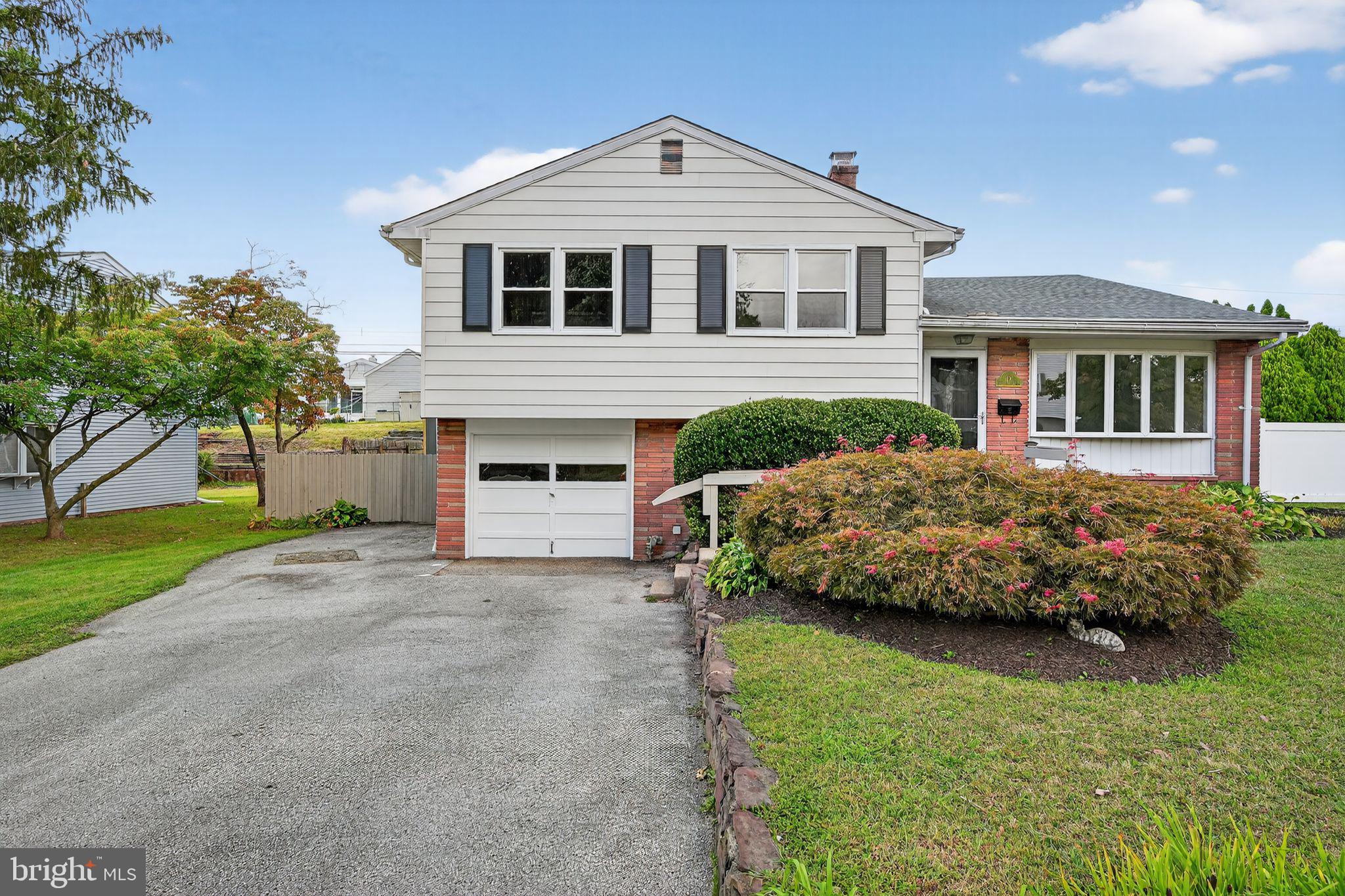 Welcome to 113 E Valley Creek Road, a beautifully renovated 3-bedroom, 1.5-bath split-level home in the heart of Plymouth Meeting. The main level showcases refinished hardwood floors, recessed lighting, and a bright open layout that flows seamlessly into the updated kitchen. Here you’ll find a central island, modern countertops, stainless steel appliances, crisp white cabinetry, and easy access to the sunroom at the back of the home, flooded with natural light and the perfect spot for morning coffee casual gatherings.
Upstairs, three comfortable bedrooms feature brand-new carpeting and share an updated full bath with modern finishes. The lower level has been thoughtfully finished with durable vinyl plank flooring, a convenient half bath, and plenty of flexible living space that could serve as a family room, home office, or gym. Fresh paint throughout, new windows, and a one-car garage make this home truly move-in ready.
The location is desirable, being just a short walk to East Plymouth Valley Park, a 22-acre community hub with playgrounds, sports courts, fields, and walking paths. With its combination of stylish updates, versatile living spaces, coveted school district, and convenient location near shopping, dining, and major highways, this home offers the perfect blend of comfort and everyday convenience.