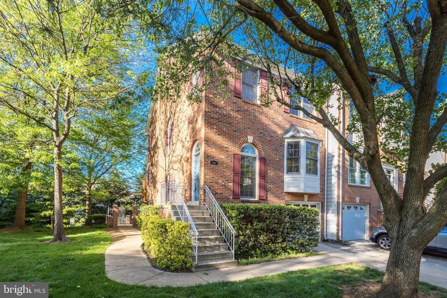 A spectacular light-filled, end-unit townhome with a garage. This 3 bedrooms, 2.55 bathrooms home has rich, gleaming hardwood floors in the living room and dining room.  The large eat-in kitchen with recessed lighting features granite countertops and ample cabinets.  A three-sided fireplace separates the living room from the dining room.  There is a french door in the dining room that leads to the upper-level deck. The master bedroom features vaulted ceilings, a large walk-in closet, and an updated master bathroom.  The spacious lower level has a fireplace and a french door that leads to a fenced-in patio with a gate that leads to the side of the house which faces a gazebo and a grassy area.  There is an additional storage area with shelving in the garage.  This ideal location is minutes to Tyson’s Corner, 495, 66.