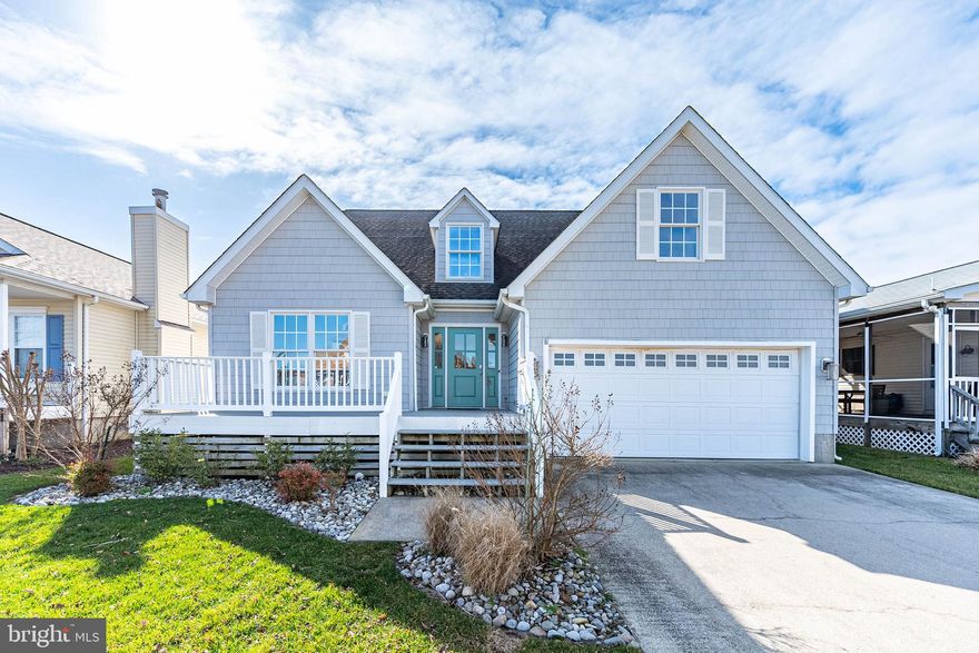 This exquisite Cape Cod home, spanning 2,145 square feet, is nestled in the serene North Ocean City area, in the Caine Woods Community, NO HOA FEES, offering a harmonious blend of spaciousness, style, and comfort. With 5 well-appointed bedrooms and 3 full bathrooms, this home caters to a variety of living needs, featuring two primary bedrooms on the first floor that provide convenient and accessible living options. The architecture fosters an open floor plan that encourages a seamless flow between living spaces, accentuated by abundant natural light that illuminates the interior throughout the day. Vaulted ceilings add an element of grandeur and openness, creating an inviting and expansive atmosphere. Central to the home's communal area is a wood-burning fireplace, adding warmth and a cozy ambiance to gatherings, especially during the cooler months. Culinary enthusiasts will be drawn to the large, modern kitchen, which is outfitted with granite countertops and stainless steel appliances, marrying functionality with sleek design. This space is ideal for preparing family meals or entertaining guests, with ample room for dining and socializing. Outside, the home features a private fenced-in yard, offering a secluded oasis for outdoor activities, relaxation, or gardening. This space ensures privacy and security, making it a safe play area for children or pets. Located in a tranquil part of North Ocean City, the home's residents will enjoy the convenience of being close to a plethora of restaurants, catering to a wide range of tastes and preferences. Additionally, the proximity to Ocean City's myriad attractions ensures that entertainment and leisure activities are never far away, from beach outings to exploring local shops and venues. This property epitomizes coastal living at its finest, providing a peaceful retreat without sacrificing accessibility to urban amenities and the vibrant Ocean City lifestyle. NOT IN A FLOOD ZONE.