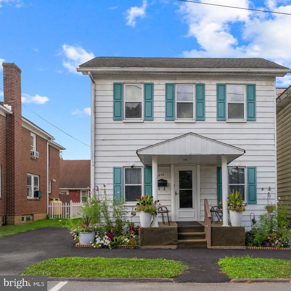 Welcome to this beautifully remodeled home in the heart of small-town Philipsburg! Featuring fresh updates throughout, including neutral paint, new carpet and flooring, this home is move-in ready and full of charm. The first floor offers a spacious living room, convenient laundry area, and a large mudroom with back porch access and a cozy sitting area. Step outside to enjoy the roomy back porch, perfect for relaxing while overlooking the easy-to-maintain yard. Upstairs you’ll find 3 comfortable bedrooms and a full bath, along with stairs leading to a walk-up attic—ideal for extra storage. The exterior is just as inviting with lovely flower garden beds greeting you at the front of the home. A wooden shed provides additional storage, and you’ll appreciate the 2 off-street parking spaces accessible from the rear alley, plus optional on-street parking! Clean, well-maintained, and thoughtfully updated, this home is ready for its next chapter. Just 20 minutes to Penn State University—perfect for weekend getaways or football game days!