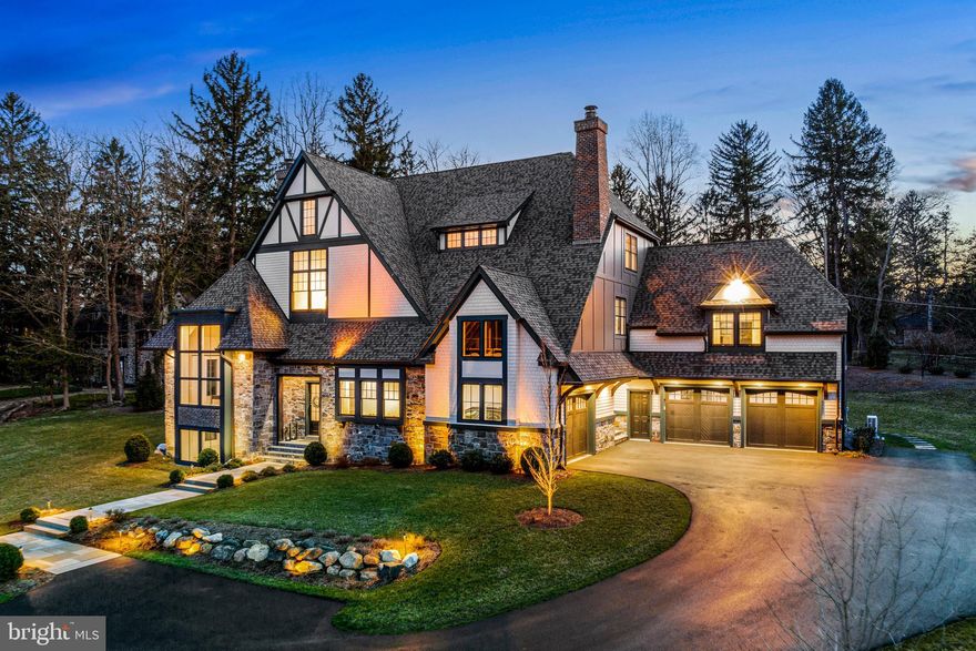 Simply spectacular! This timeless, sophisticated, sun-filled residence is an impressive show stopper at every turn, both inside and out. Majestically set on a beautifully landscaped 1.7 acre lot in one of the most prestigious walkable neighborhoods of The Main Line, it offers breathtaking architectural designs, soaring ceilings, superior materials, custom craftsmanship,  expansive windows and glass doors with private views, and a wonderful open floorplan, conducive to effortless large scale entertaining and comfortable everyday living. Countless one of a kind features include a dramatic 2-story foyer with multiple private exterior exposures close to world famous Merion Golf Club, a large private office with vaulted ceiling, stunning vistas and fireplace, expansive great room with modern gas fireplace insert opening up to an incredible  custom- designed top of the line gourmet kitchen, convenient butler's pantry/ wet bar leading to inviting dining room space, inviting outdoor logia room with fireplace and additional terraces capturing the private grounds and gardens. The second level offers a luxurious "Four Seasons" style primary suite bright windows, a fabulous marble bathroom and 2 walk-in dressing rooms, 3 additional spacious bedrooms with custom en-suite and Jack and Jill baths and a generously proportioned laundry room. The finished walk-up third level offers an additional 1340 square feet of flexible living space and features a 5th bedroom, full custom bathroom and an enormous media, lounge area. All levels, including the partially finished, daylit lower level, are designed to be accessible by an elevator, with the shaft already in place. This Haverford treasure also features a beautifully finished in-law suite with private entrance, 6th bedroom fabulous white tiled full bathroom with frameless glass shower, sitting room area and walk in closet, built over one of the oversized attached garages. Enjoy complete privacy and peaceful outdoor living spaces with easy access to renowned schools, world class clubs, shopping, restaurants, sports complexes and more. Located only minutes from local and regional trains, Philadelphia and Philadelphia International Airport. Move Right In!