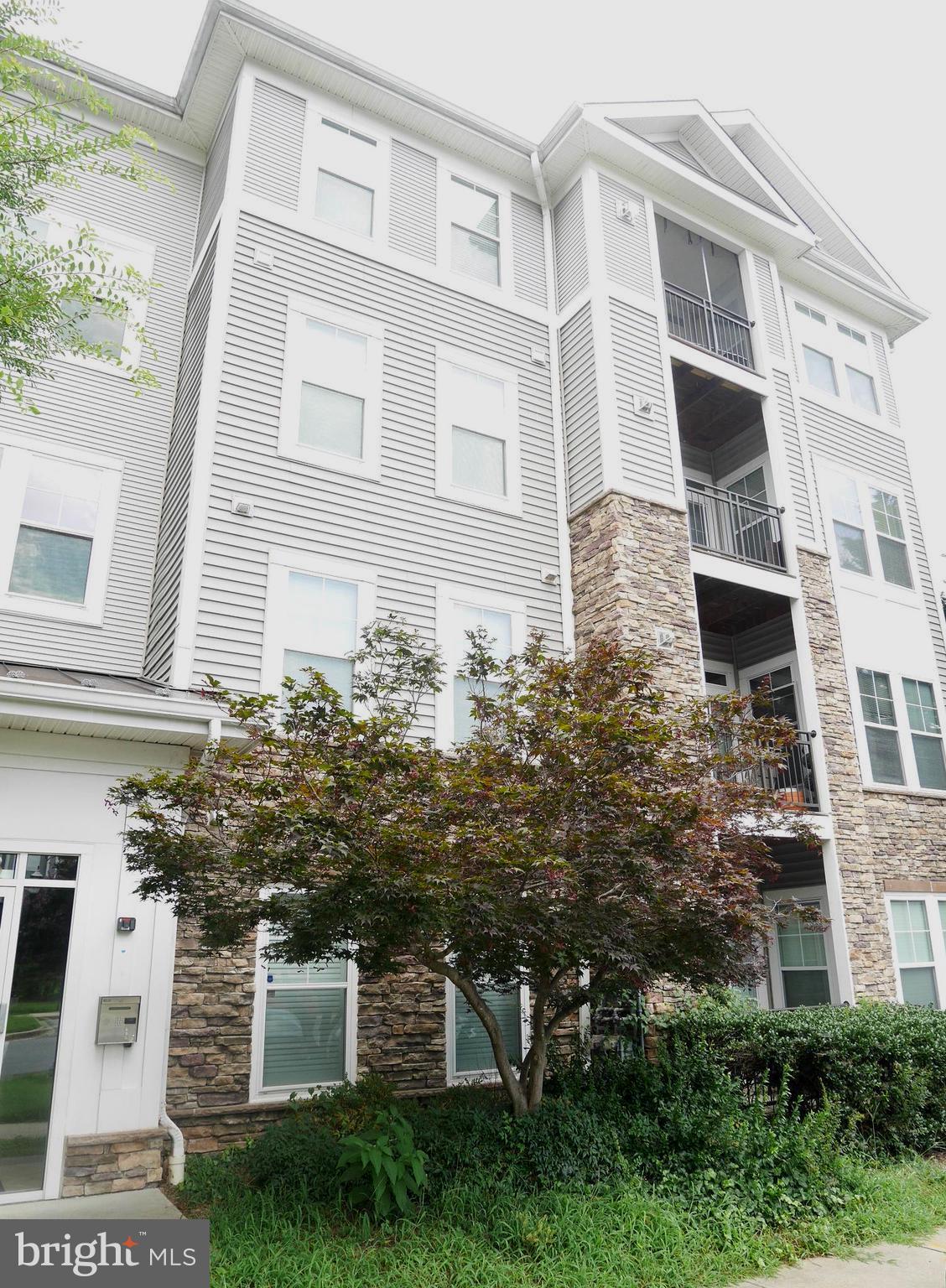 Welcome to your perfect blend of comfort and convenience! This beautifully maintained 1-bedroom, 1-bath top floor condo which offers modern upgrades and a commuter’s dream location. Step into a bright living room featuring a ceiling fan and cozy fireplace, with a door that open to your private balcony—ideal for morning coffee or evening unwinding.
The open-concept kitchen boasts granite countertops, stainless steel appliances, and a breakfast bar perfect for casual dining. You'll love the spacious bedroom with a generous walk-in closet and the in-unit full-size washer and dryer for everyday ease.
Located just a 2-minute walk to public transit and minutes from I-495, you’re perfectly positioned for an easy commute. With the airport only a few miles away and Washington, DC just minutes down the road, this home delivers comfort and accessibility in one elegant package.
*One Year Lease required
*Background and Credit Check Required.
*One Pet Permitted Under 15 Lbs. with Additional Monthly Pet Rent ($50 a month pet rent)
