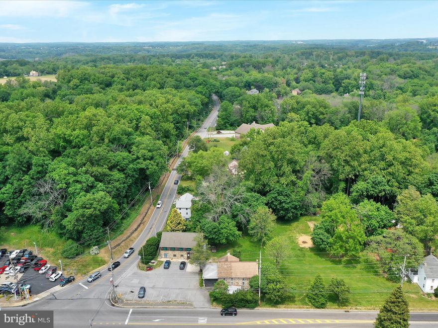 Located in the true heart of downtown Gradyville lies an opportunity to write yourself into the rich history of two of Edgmont Township’s most recognizable dwellings, the former “Gradyville Inn” (dating back to approximately 1740) and the Gradyville Post Office(currently cash flowing at $36,500 annually with a lease in place until 11/2026!). Situated on a sprawling corner property with high visibility, this parcel is in the C-1 Zoning District, but allows for both commercial AND residential uses. It goes without saying that Edgmont’s residents prefer that the post office remain, and that is the wish of the owner, as well (sale subject to current lease). With a current lease of $3,041/month ($36,500 annually, through November, 2026),  the new owner will have immediate income as they work with the township on their vision and plans for this parcel on a prominently located corner property in charming Gradyville.  The post office (#1347) is a two-story dwelling (approximately 3,000sf total) with the 2nd story consisting of five offices (see agent for current permitted uses and the Township for possible permissible uses), a bathroom and utility room. There is private access to this level via an exterior stairwell on either side of the building.The following ideas for suggested use will all need to be outlined and proposed to the Township for approval:  The former Gradyville Inn can be restored to its grandeur, or with Edgmont Twp approval, made into a twin home, as the footprint is large enough to accommodate for two side-by-side residences. The 2nd and 3rd floors have 4 bedroom each, with a second kitchen (plumbing is there) on the 2nd level. Deep window wells, incredibly intricate millwork and tiles from the 1740's. Thinking of adding a single-family dwelling to this property, or potentially two if allowable (2 acre minimum, so this would require the former Inn to be demolished)? Bring your vision to the Township and be the catalyst to improve this special parcel in historic Gradyville.    Note: As per Edgmont Township, “The C-1 District is designed primarily for commercial development with a view toward serving the general convenience shopping or service needs of local neighborhoods and the residents of the Township; providing areas which are nearby and accessible to such neighborhoods and residents; establishing regulations to help ensure compatibility with adjacent residential uses; and promoting more of a village-type character with small buildings in scale with and/or similar to those in historic Gradyville.