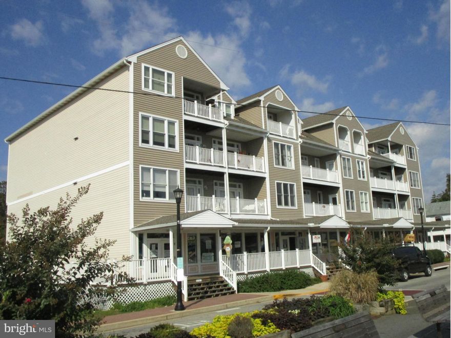 Condo overlooking Chesapeake Bay, Beach and  Boardwalk.  Located in quaint town of North Beach, walk to shops, restaurants, local medical services.  This condo has just had a total renovation and updating.  Split bedroom floor plan, two large walk-in closets, two baths, a large living room, and a large deck. Great view. Loads of Parking. Fees include Water/Sewer,Trash, Insuranc