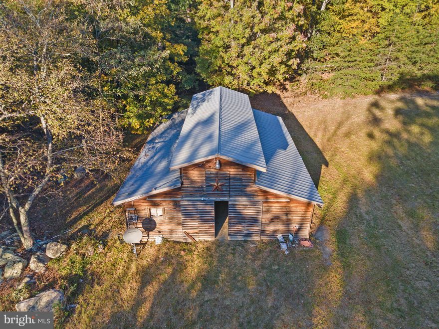 Escape to the stunning mountains of Capon Bridge with this beautiful 5-acre parcel of land, perfect for recreation and your building your own dream cabin getaway! Nestled in a serene setting, this property offers incredible views, abundant wildlife, and endless opportunities for an outdoor lifestyle. Imagine building your own retreat surrounded by nature, where tranquility and relaxation await. With easy access to local amenities, this is the ideal spot for your mountain escape. Don’t miss out on this rare opportunity—start creating your perfect haven today! (NOTE: GPS will not get you all the way to the property if you drive by -- please call for specific directions!)