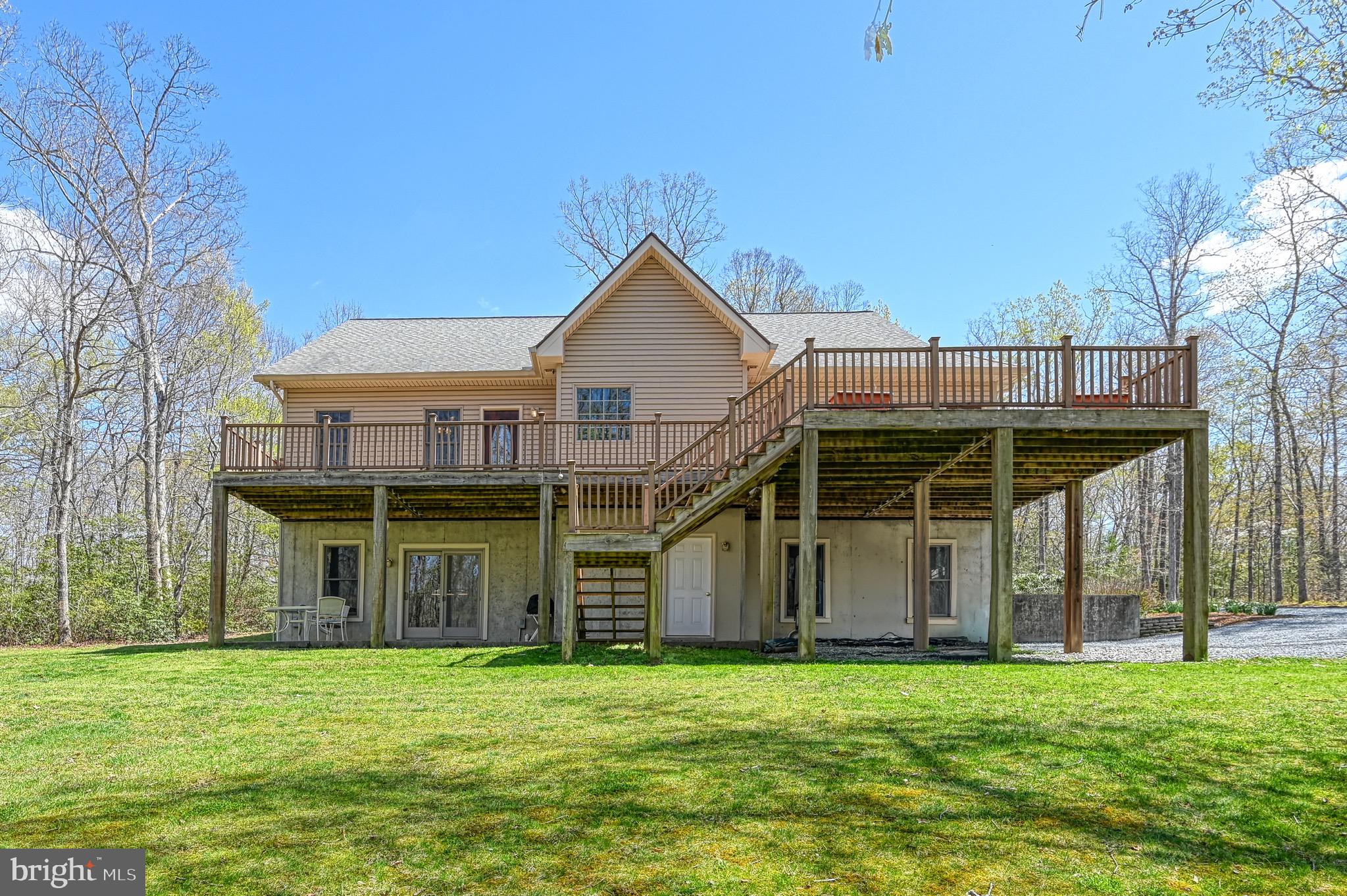 Back on the market due to no fault of the seller. Welcome to 211 Windswept Rd, Mineral, VA – Located in the highly sought-after gated community of Windwood Coves on Lake Anna! This spacious and well-maintained home offers over 3,600 sq ft of living space across three levels, perfectly suited for full-time living, weekend getaways, or as a short-term rental investment (STRs are permitted).
The main level features over 1,800 sq ft, including a bright living room, open kitchen and dining area, three bedrooms, and two full bathrooms. Upstairs, a 500+ sq ft bonus room offers flexibility for a 4th bedroom, office, or playroom.
The finished walkout basement includes a full bath, game room with a second dishwasher and new refrigerator, a media room equipped with a 5-way surround sound system (amp conveys), laundry room, oversized two-car garage, and a utility room with a dedicated freezer receptacle. The game and media rooms will be repainted the buyers chosen colors and fat heads will be removed.
Additional highlights:
- Whole-house generator
- Propane-fueled: cooktop, dryer, fireplace, tankless water heater, generator, and backup heating system
- Microwave replaced in 2023
- Kitchen dishwasher replaced in 2022
- Roof replaced in 2016(hail damage)
- Hardwood floors recently refinished
- All new carpet throughout
Windwood Coves is one of Lake Anna's premier waterfront communities, offering over 5 acres of shared amenities:
- Large sandy beach
- Tennis & pickleball courts
- Basketball court
- Beach volleyball
- Tot lot & four picnic pavilions
- Assigned boat slip included with each property
Don't miss the chance to enjoy lake living at its finest in this incredible home and amenity-rich community!