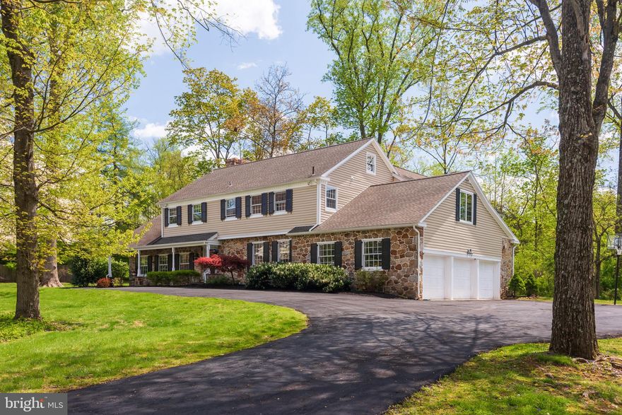 Welcome to 336 Chester Road, a classic center hall Colonial with a huge circular driveway, set on a partially wooded TWO ACRE lot in the heart of the estate section of Devon. This is a rare opportunity to own a wonderfully updated home in a PRIME LOCATION within the Tredyffrin-Easttown School District. The perfect blend of Old World detailing and modern updating. A fabulous home for all seasons, both inside and out. The gracious transverse foyer offers a split staircase. To the right you'll find the nicely sized formal dining room with French doors for privacy, the perfect setting for entertaining and holiday celebrations. To the left is the grand formal living room featuring exposed beams, a gas fireplace and French doors opening to the wonderful screened porch. The heart of the home is the renovated eat-in kitchen which features gleaming granite countertops, a granite topped center island with double stainless-steel sink, a huge walk-in pantry, raised panel cabinetry with undermount lighting, tile backsplash, stainless steel appliances and an open dining area overlooking the family room addition with a doorway to the patio. A rear staircase tucked behind the kitchen leads to the second floor. The fabulous family room offers high ceilings, an exposed stone wall, Palladian windows, plantation shutters, a gas fireplace and French doors to the patio area. In addition, there is a centrally located office/den with French doors as well as a door leading onto the screened porch and is the perfect spot for working from home or attending online classes. A nicely situated powder room and a mudroom area leading to the three car garage complete the picture for the first floor of this lovely home. The upstairs is divided into two separate wings. The right wing is home to the sumptuous owner's suite offering a sunny sitting area, tray ceiling, two walk-in closets and a tastefully renovated owner's bathroom with new Kohler fixtures, a corner whirlpool tub overlooking the woods, an oversize shower and twin vanities. Surround sound speakers in the owner's bedroom and bathroom create a spa-like environment. Three more bedrooms, each with tremendous closet space, are serviced by two additional bathrooms. The second floor laundry room offers a laundry tub with built-in folding table and cabinets. A huge walk-in linen closet provides tremendous storage. A bedroom-sized storage room offers many finishing possibilities. The second floor's left wing is a fully separate in-law/ guest/ secondary suite with great closet space and its own private bathroom. The finished basement with a powder room can be used as a second family room and is a flexible space offering endless possibilities. The outside spaces of this home are spectacular. The fantastic grounds feature soaring shade trees, creating a true oasis. The rear flagstone patio is the ideal spot for relaxing, entertaining, grilling and dining al fresco. A covered front porch is the perfect place to relax and to watch the annual Devon Horse Show Carriage Parade. The screened in porch is a great spot to take in the great outdoors from a covered space. Beautiful views, gorgeous oak flooring, deep window sills, built in speakers in all first floor rooms, tremendous closet space (many outfitted by California closets), two separate attics, recessed lighting, ceiling fans, an intercom system connecting the kitchen, bedrooms and basement, tremendous off street parking and an outdoor basketball area all come together to make 336 Chester Road a very special place to call home. Properties of this quality are very rarely offered for sale. A short stroll to Devon Yards, the Devon Train Station and the famous Devon Horse Show. Two blocks to Devon Elementary and minutes to TE  Middle and Conestoga High School. Close to the shops and restaurants of The Main Line. A wonderful home in a highly sought after Devon location. Your search is over. This is the one. Welcome home!