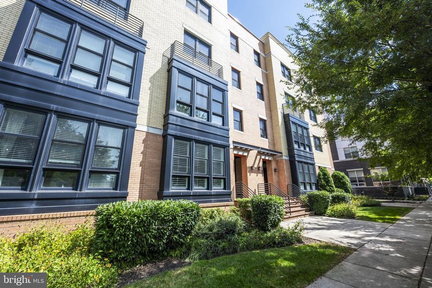 Welcome to this immaculate townhome-style luxury condo, complete with a garage and private driveway, ideally situated in a prime Alexandria location. Designed with both style and comfort in mind, this home is filled with natural light and offers a seamless blend of modern finishes and thoughtful details. The main level features rich hardwood floors and a spacious open-concept living and dining area, ideal for entertaining or relaxed family living. The chef’s kitchen is a showpiece, boasting white cabinetry, upgraded granite countertops, stainless steel appliances, recessed lighting, and elegant fixtures. Every detail has been carefully chosen to create a space that is both functional and visually stunning. Upstairs, the luxurious primary suite offers two walk-in closets, a private balcony, and a spa-inspired bathroom with dual vanities and a frameless glass shower. Two additional generously sized bedrooms, one with a walk-in closet, plus a full-size laundry closet complete this level, providing both convenience and comfort.
This exceptional home is just steps from the Potomac Yard Metro Station, INOVA Health Center, and Del Ray’s vibrant shops and restaurants. Enjoy easy access to Old Town Alexandria, Downtown DC, Amazon HQ2, Virginia Tech Innovation Campus, and Reagan National Airport, making commuting and city living effortless.
A rare opportunity to own a home that combines elegance, space, and an unbeatable location,truly a perfect blend of luxury and lifestyle.