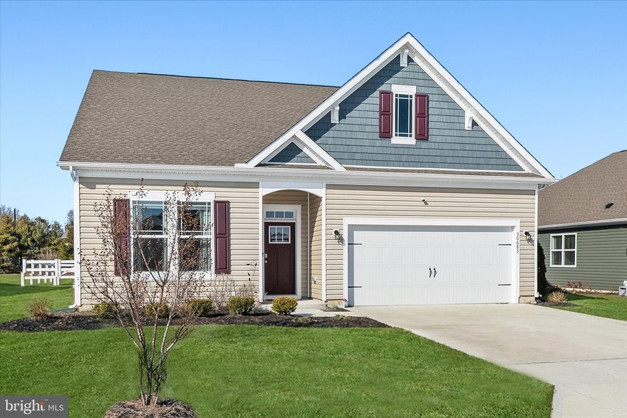 Welcome to 30683 Waterfront Drive in the sought-after community of Stonewater Creek, where pond-front living and thoughtful designs come together in a beautifully maintained three-bedroom, two-bath ranch home. Set on a scenic lot with a fenced backyard, attractive landscaping, and a rear patio ideal for outdoor entertaining, this home offers inviting spaces both inside and out. 

Step into a bright, airy interior featuring a neutral paint palette and LVP flooring throughout the main living areas. The gourmet kitchen is a standout with a spacious island, sleek granite countertops, white Craftsman-style cabinetry, stainless steel appliances, a five-burner gas stove, and a double sink. The open floor plan flows easily for everyday living and entertaining, with a spacious living room that accommodates dining space along with a cozy breakfast nook off the kitchen. Sliding glass doors lead to the patio, creating a seamless indoor-outdoor connection. 

The primary suite provides a relaxing retreat with a walk-in closet and a private en suite bath featuring a dual-sink vanity, stall shower, and separate water closet. Two additional bedrooms at the front of the home share a full bath, offering comfortable space for guests or a home office.  This property has a security system (owned) for added peace of mind.  

Residents of Stonewater Creek enjoy amenities including a clubhouse, fitness center, outdoor pool, pickleball and tennis courts. Located just minutes from restaurants, shopping, Rehoboth and Lewes, as well as the bay and the ocean, this home blends tranquility with convenience. Schedule your visit and experience this wonderful home for yourself.