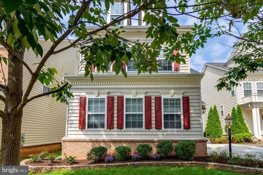 Beautiful single family home in heart of Haymarket. Pack your boxes. Move right in. Fresh paint, stunning wood floors, gourmet kitchen, almost 3500 square feet await you.  Huge master bedroom w/walk-in closet and spa-like attached master bath. Three other spacious bedrooms and a full bath upstairs. Finished basement w/another full bath. Deck, patio, fenced yard. New Roof 2017! What's not to love!