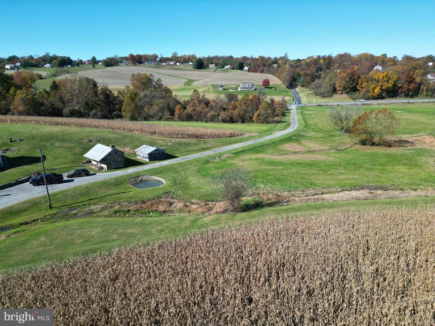 Property back on the market due to financing . 
Welcome to this expanse of 180+  acre Farm offering endless possibilities! This remarkable property features two charming homes, perfect for the multi-generational living or rental income. A tranquil creek meanders through the land, adding to its natural beauty, along with a historic spring House. The property offers mature trees, multiple outbuildings for storage or farming equipment, and garages for vehicles or workshops. Whether you're looking to farm, enjoy outdoor recreation, or create your own private retreat, this Farm has the space and potential to make your vision a reality!
