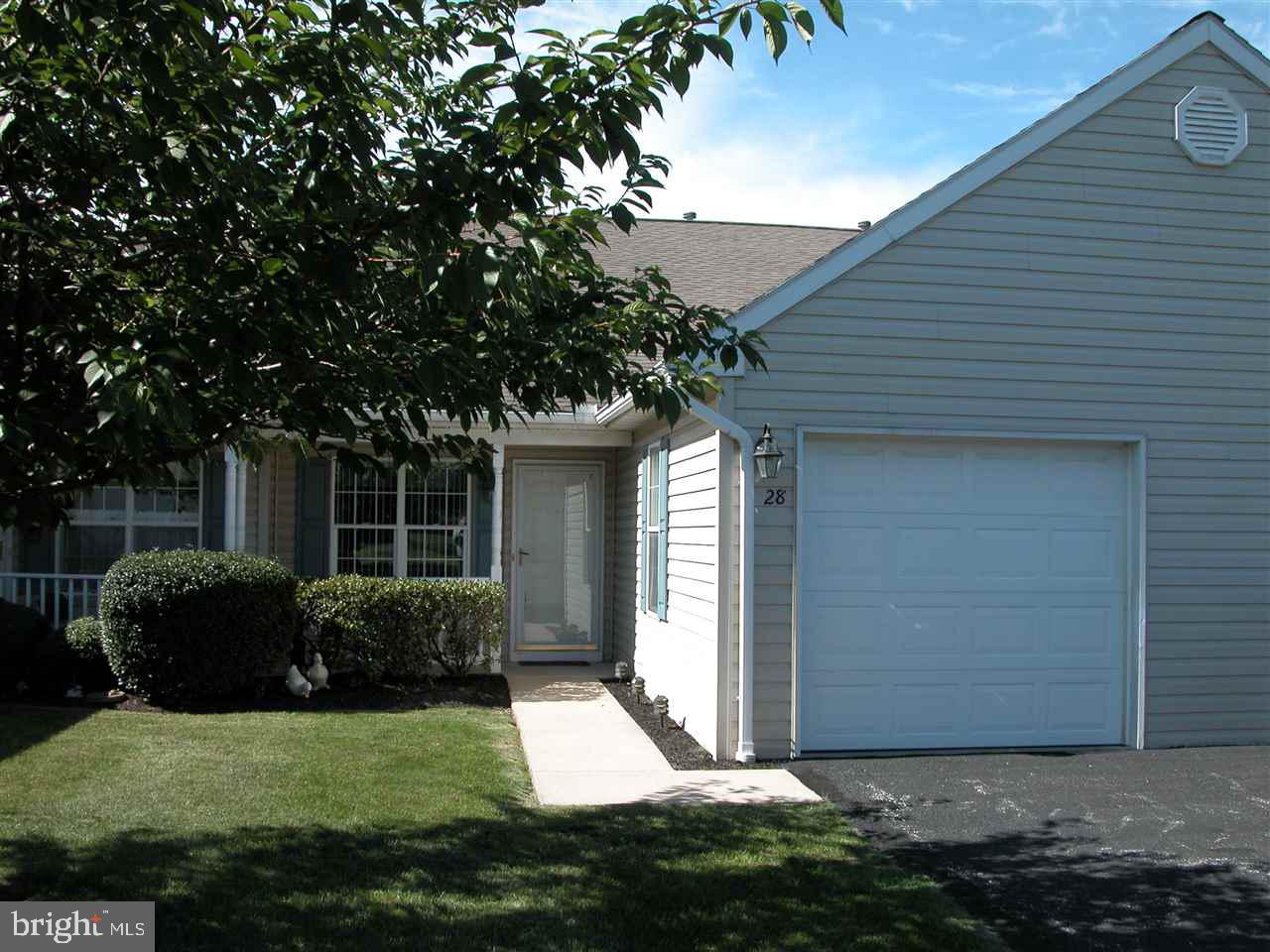 Extremely Comfortable Ranch Condo! New Pergo Laminate Floors & New Carpet have been Installed. Terrific Open Floor Plan. Large Kitchen with New Oven/Range, New Sink & Big Breakfast Bar. Master Bedroom has Full Bath w/ Easy Access Shower. Convenient Location! Entrance with Nice Covered Porch. Just a Wonderful Condo that has been Meticulously Maintained!!!