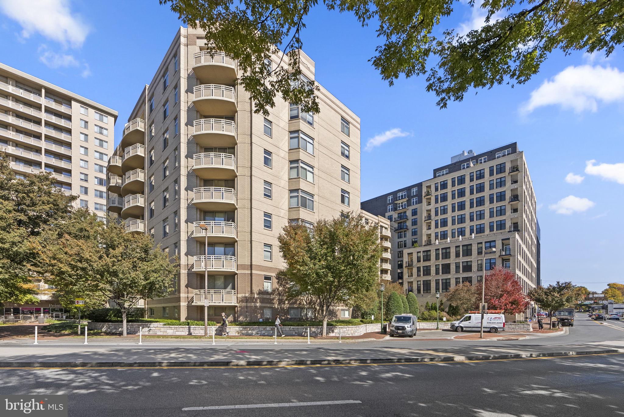 20K price improvement! Located in the heart of Bethesda with unbeatable walkability and sought-after amenities, this beautifully updated 1-bedroom, 1-bath condo offers the perfect blend of urban convenience and everyday comfort. Enjoy the ease of assigned garage parking, a fully equipped fitness center, and a recently renovated lobby—all set within a peaceful, park-like community. Inside, thoughtful updates and spacious design make it just as impressive as its location. Soaring 8.5-foot ceilings enhance the sense of space as you step into the open-concept layout, where the kitchen, dining, and living areas flow seamlessly together. The kitchen boasts stainless steel appliances, granite countertops, sleek blue cabinetry, and a breakfast bar for casual dining. Adjacent dining and living spaces create an inviting area for relaxing or entertaining. The generously sized bedroom features a walk-in closet with built-in shelving and direct access to the full bath, which is also accessible from the main living area—ideal for guests. Enjoy the convenience of an in-unit washer and dryer. Recent updates in 2024 include luxury vinyl flooring, fresh paint throughout, modern light fixtures, new blinds, and a new microwave. Building amenities include a fitness center, updated lobby, and assigned garage parking with a personal bike rack. Located just steps from Bethesda Row, the Capital Crescent Trail, Trader Joe’s, Giant, Target, the Farm Women’s Market, parks, NIH, Walter Reed, and the Metro, this home offers the best of Bethesda living. Schedule a showing today!