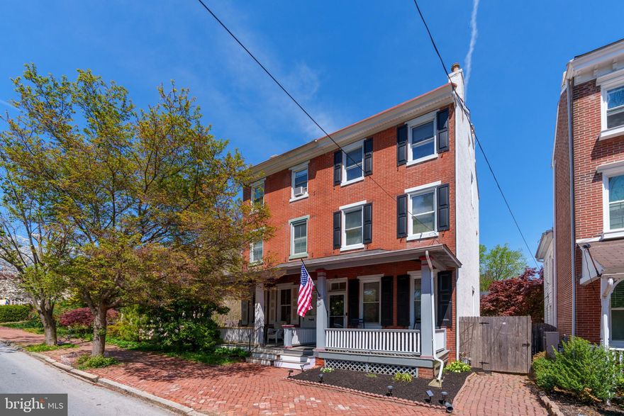 Spectacular, updated, spacious brick twin in the northwest quadrant of West Chester Boro! 431 N New St has it all – dedicated off-street parking, a fenced backyard, storage, and a beautifully updated, bright and airy home design. Outside, it starts with curb appeal, featuring a covered front porch on a quiet, residential street with brick sidewalks. Inside, this home has been thoughtfully refurbished to open up the living and dining rooms to create a large, open living space with brick accent walls and an exposed wood beam. The kitchen is updated with stunning quartz countertops, subway tile backsplash, and freshly painted cabinets and trim. The original wood flooring has been refinished throughout, and there is new carpeting. The 2nd floor boasts a charming hall bedroom and bathroom as well as an immense owner’s retreat with a huge walk-in closet with custom shelving, and a truly sophisticated en suite bathroom. Designed to the nines, this is the bathroom of your dreams with a large walk-in shower, chic tilework, and a vanity with 2 sinks. Not to be outdone, the 3rd floor has been completely renovated and features 2 quite spacious bedrooms. Plus, 431 N New St has an unfinished basement as well as a stand-up attic which both offer plenty of storage. Updates continue into the back yard which is completely fenced and features a low-maintenance Trex stairway to a new stamped concrete patio. There is also side access to the back yard, and there are 2 dedicated parking spaces at the back. A truly turn-key home just blocks from the library, you’ll have the Boro’s vibrant shopping and dining scene at your fingertips. This home deserves a personal visit! Request a tour today.