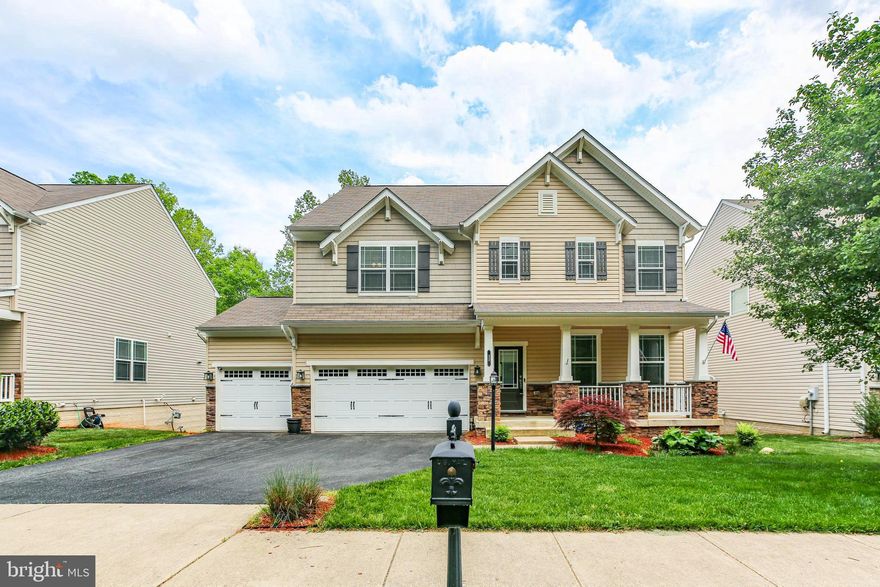 Welcome! This 6 bedroom, 4 bath, 3 car garage, open floor plan home sits on a beautiful lot in the Colonial Forge community. This community features a pool, tennis courts, and clubhouse. When you walk inside this home you'll see its' gorgeous hardwood floors, tall ceilings, open layout! Large upgraded kitchen features white cabinetry, stainless steel appliances (double oven and a gas cooktop), double-door pantry and granite countertops. Other main level highlights include the family room with stone surround fireplace with mantel, a bedroom/flex space/office with a closet, half-bath, garage access and storage closets. The upper level includes four bedrooms, two full baths and an immense loft area. The primary suite includes elegant tray ceilings, an expansive walk-in closet and ensuite bath complete with a soaking tub with tile surround, glass-enclosed shower and double sink. Upstairs has mostly new carpet. Upper level laundry room makes carrying loads quick and easy. Aside the massive storage room this is a finished walkout basement! You’ll find the home’s final bedroom with a walk-in closet, and full bath here. The lower level is anchored by a recreation room with a wet bar. There is plenty of space if you ever wanted a game area, home theater set-up and more.  From the basement, walk out to your beautiful stone patio where youll find your hotub and stairs that walk up to your large deck connected to the main level. The fenced in back yard boast a beautiful garden area with a firepit! With this location, You're just minutes away from multiple schools, the new Embrey Mill Town Center with grocery, dining, shopping options and I-95! Motivated Seller! Schedule your showing today!