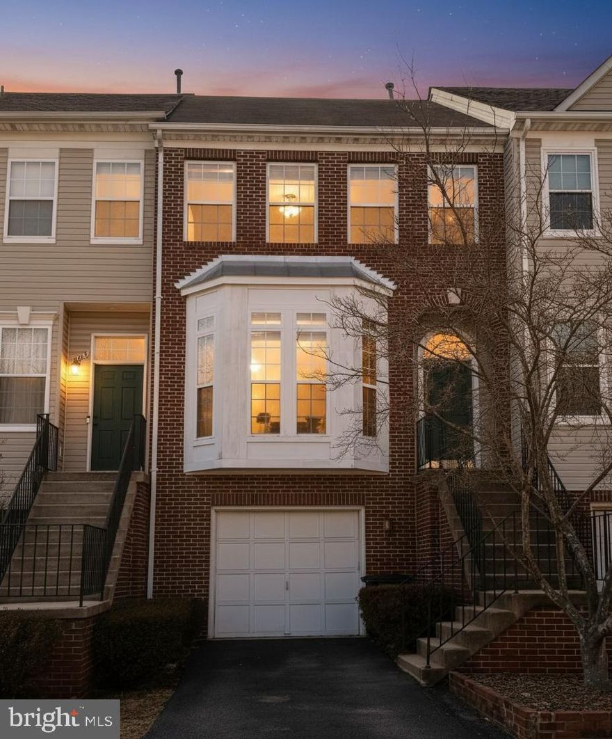 Stunning move-in ready end-unit in Centreville’s Bryarton! This sun-filled home features 3 finished levels, 3 BR, 2.5 BA, and a 1-car garage.  The main level shines with oak hardwoods and an eat-in kitchen with an island. The primary suite boasts vaulted ceilings, a walk-in closet, and a jetted soaking tub. The walk-out lower level features a cozy gas fireplace and storage.  The upper level is a sanctuary of comfort. The expansive primary suite features dramatic vaulted ceilings, a large walk-in closet, and a spa-like ensuite bathroom equipped with a dual-sink vanity, a stand-alone shower, and a jetted soaking tub for ultimate relaxation. The two additional bedrooms also feature soaring vaulted ceilings, creating an airy and spacious feel rarely found in townhomes. Relax on the freshly stained deck or in the fenced backyard. Located on a quiet street with easy access to I-66, Rt 28, and Rt 29. Minutes to shopping, dining, and parks! Ideally situated for commuters with rapid access to Routes 28, 29, and I-66, you are just minutes from premier shopping, dining, and recreation.