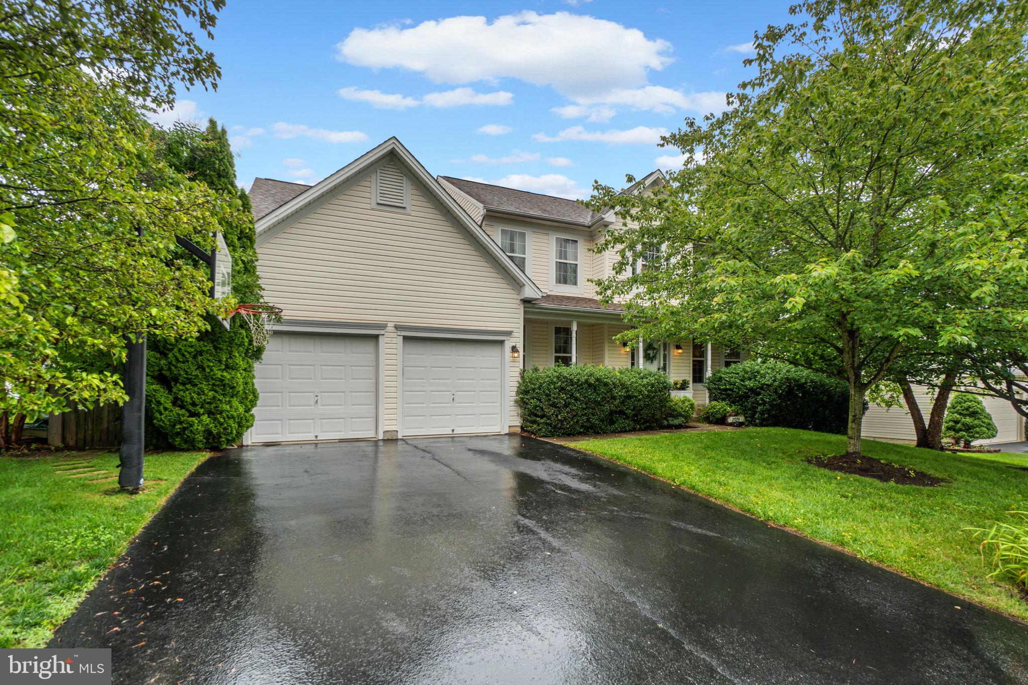 Welcome to 2974 Corona Court – A Stunning Blend of Light, Space, and Style!! Tucked away on a peaceful cul-de-sac, this beautiful Colonial offers the perfect mix of charm and function. Step into a bright two-story foyer and enjoy the open layout, fresh flooring, and natural light that fills every corner of this home. The heart of the home is the updated kitchen featuring a two-tone cabinet design, stainless steel appliances, custom open shelving, and a view that stretches out over the rear yard and open green space. The spacious family room impresses with soaring ceilings, oversized windows, and a dramatic floor-to-ceiling stone fireplace. Upstairs, the expansive primary suite provides a peaceful retreat with plenty of room to unwind. Additional bedrooms are spacious and filled with light. The fully finished basement offers even more room to spread out, including a large rec space and a separate storage area to keep everything organized. Additional highlights include—but are not limited to—a two-car garage with ample storage, a private backyard that backs to open space, a rear deck, a lower-level patio, and a location that offers the perfect balance of privacy and convenience.