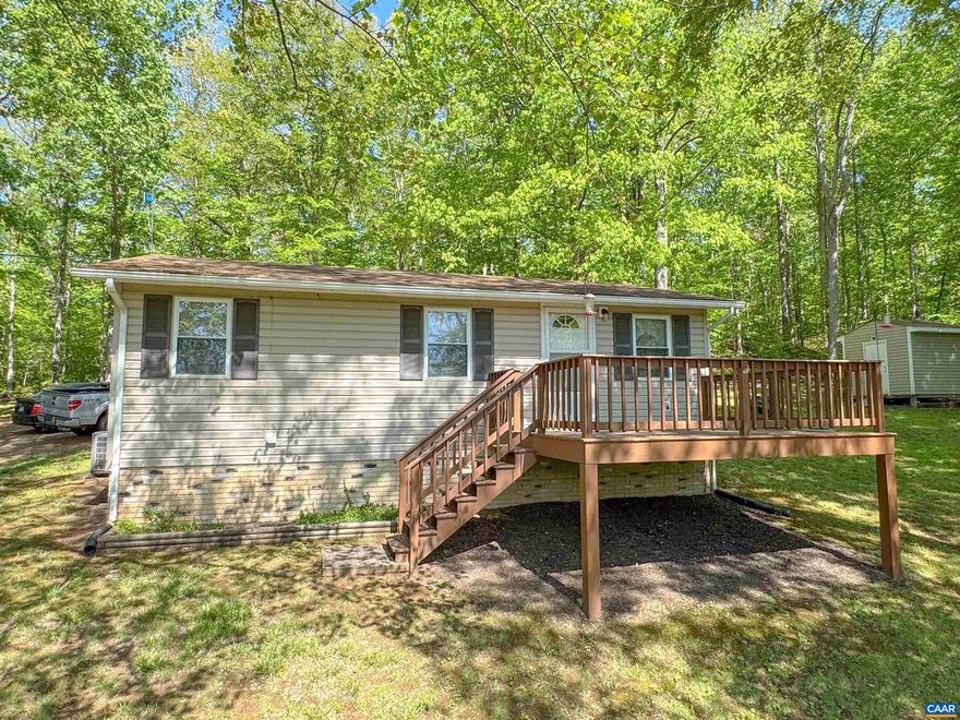 Nestled in the heart of Schuyler, this well-cared for home is situated on an acre lot with-in 30 mins of Charlottesville.  This two bed and one bath move-in ready home has large front porch, back deck, and fire pit!  A storage shed provides extra space for storage. The large cleared yard gives plenty of options for pet lovers, gardening, hangouts and so much more!  Just 10 mins to charming downtown Scottsville! Highspeed internet.,Wood Cabinets
